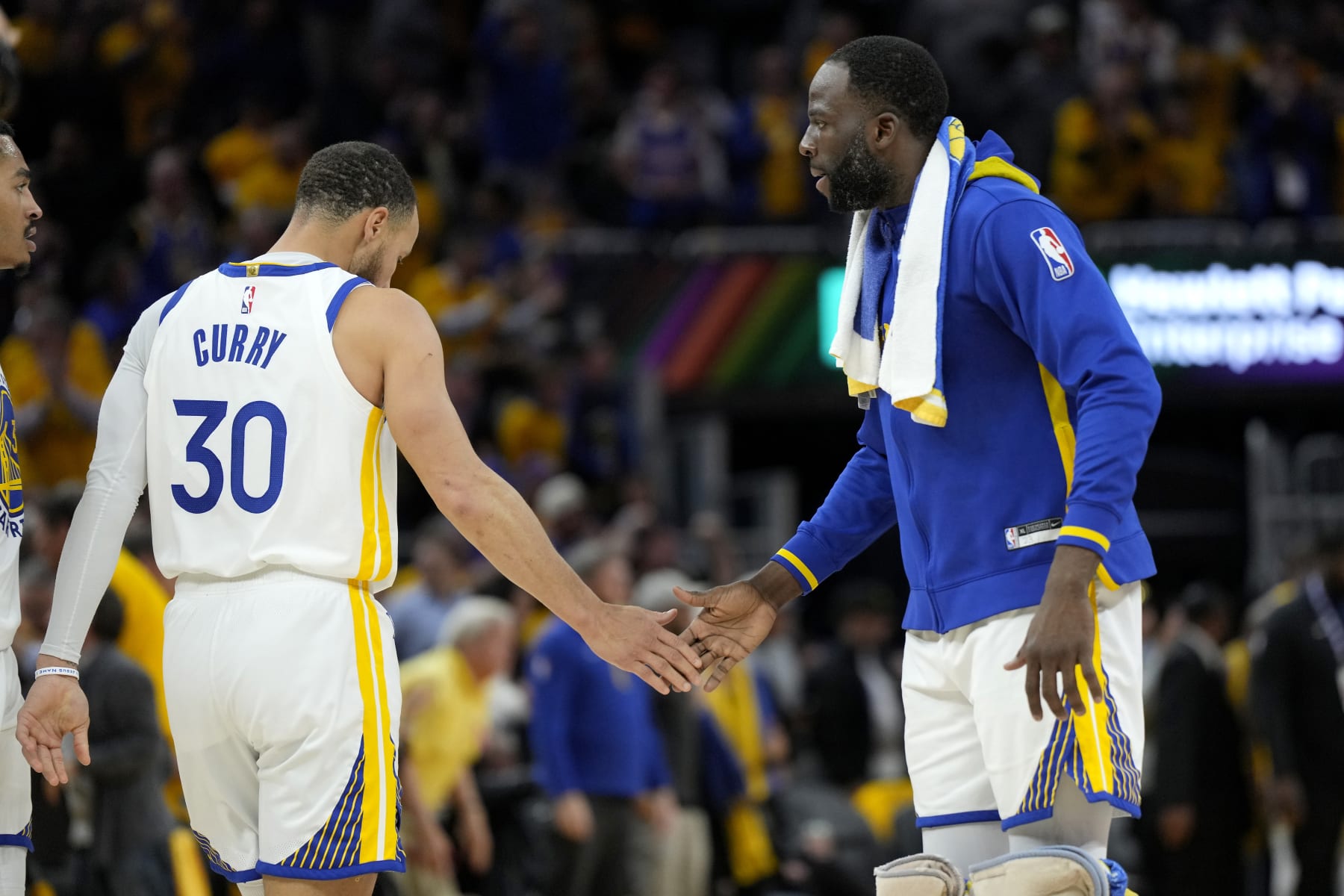 SAN FRANCISCO, CALIFORNIA - MAY 10: Stephen Curry #30 and Draymond Green #23 of the Golden State Warriors high five during the second quarter against the Los Angeles Lakers in game five of the Western Conference Semifinal Playoffs at Chase Center on May 10, 2023 in San Francisco, California. NOTE TO USER: User expressly acknowledges and agrees that, by downloading and or using this photograph, User is consenting to the terms and conditions of the Getty Images License Agreement. (Photo by Thearon W. Henderson/Getty Images)
