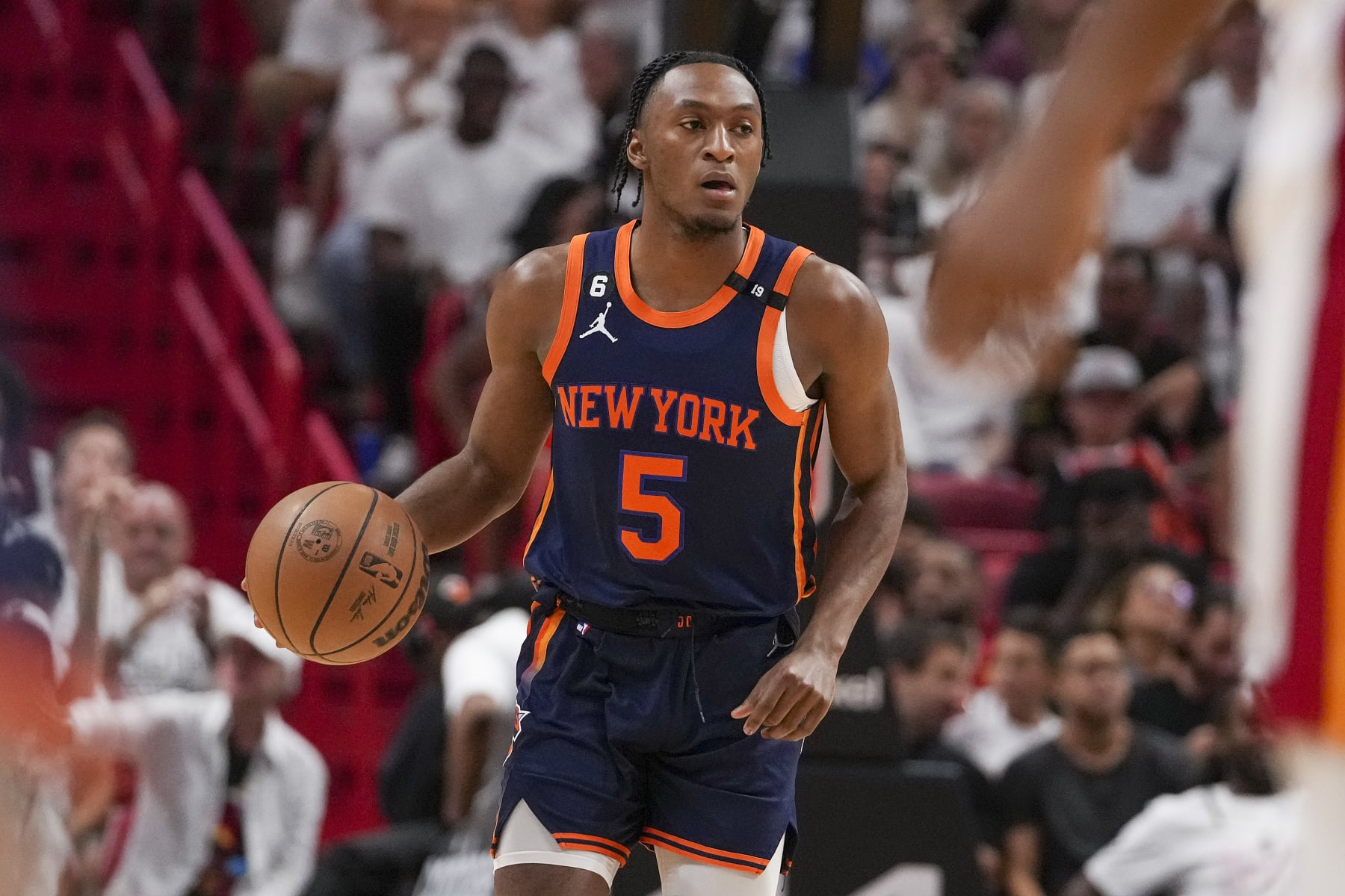 MIAMI, FLORIDA - MAY 06: Immanuel Quickley #5 of the New York Knicks bring the ball upcourt during game three of the Eastern Conference Semifinals at Kaseya Center on May 06, 2023 in Miami, Florida.  NOTE TO USER: User expressly acknowledges and agrees that,  by downloading and or using this photograph,  User is consenting to the terms and conditions of the Getty Images License Agreement. (Photo by Eric Espada/Getty Images)