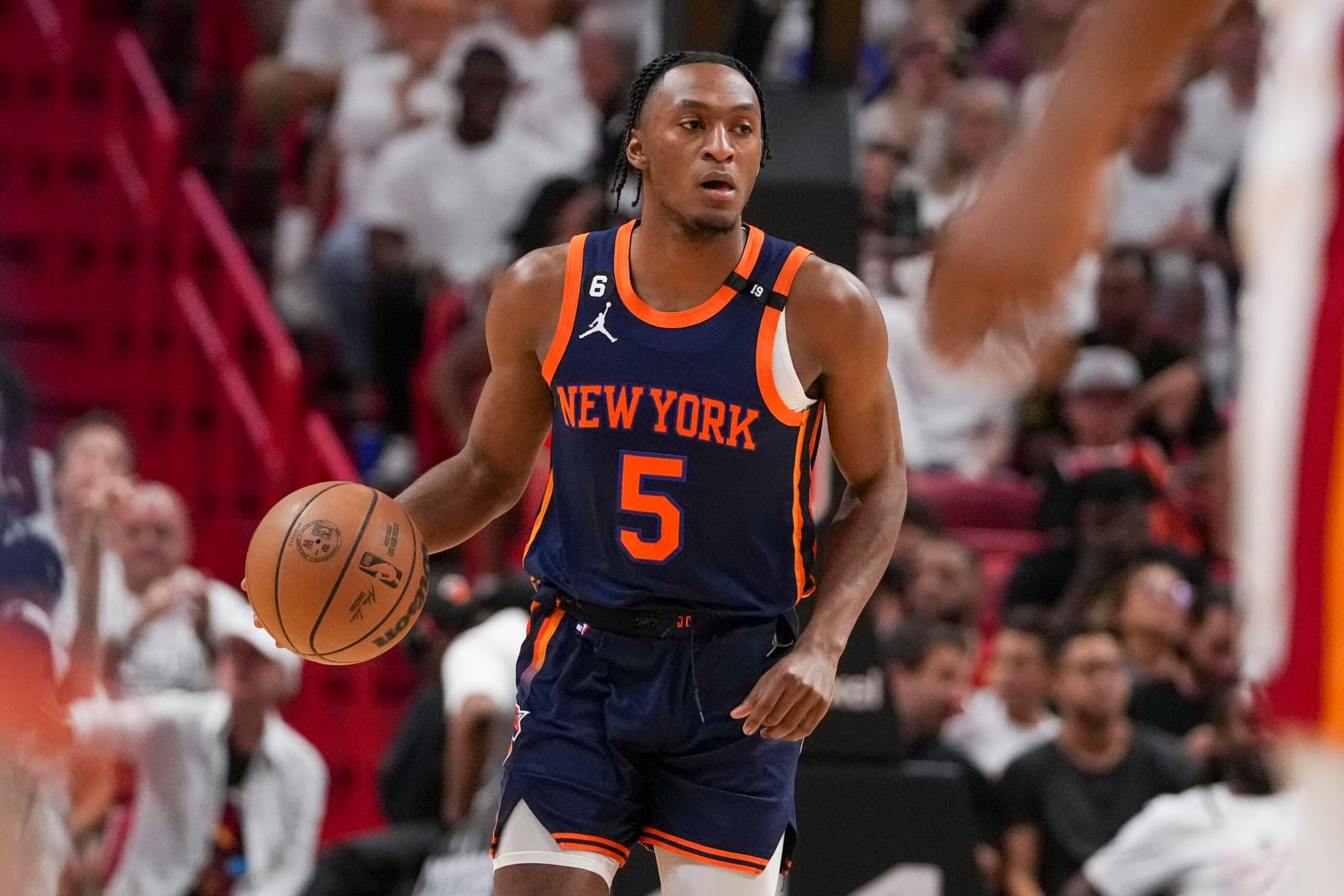 MIAMI, FLORIDA - MAY 06: Immanuel Quickley #5 of the New York Knicks bring the ball upcourt during game three of the Eastern Conference Semifinals at Kaseya Center on May 06, 2023 in Miami, Florida.  NOTE TO USER: User expressly acknowledges and agrees that,  by downloading and or using this photograph,  User is consenting to the terms and conditions of the Getty Images License Agreement. (Photo by Eric Espada/Getty Images)