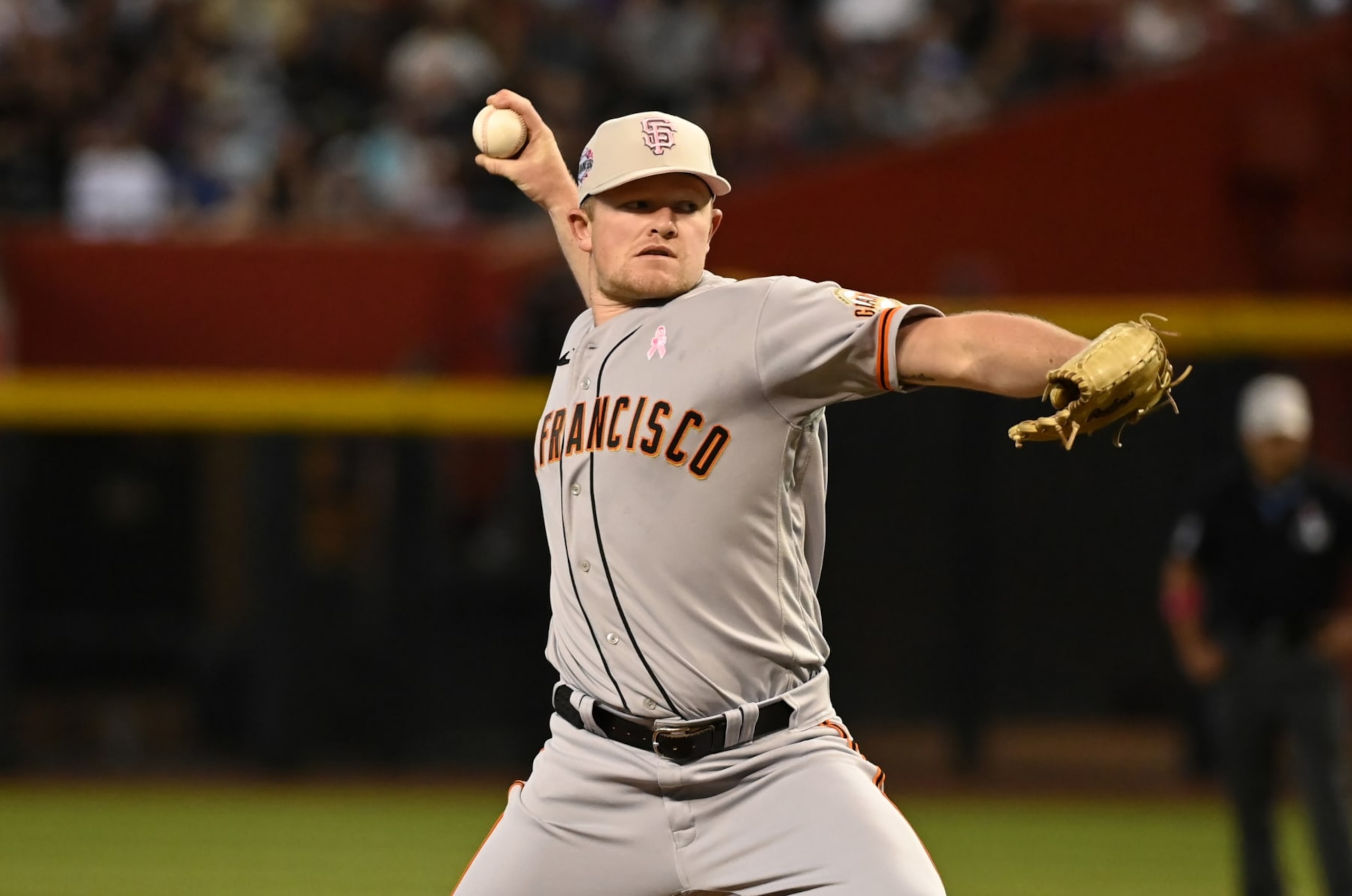 PHOENIX, ARIZONA - MAY 14: Logan Webb #62 of the San Francisco Giants delivers a pitch against the Arizona Diamondbacks at Chase Field on May 14, 2023 in Phoenix, Arizona. (Photo by Norm Hall/Getty Images)
