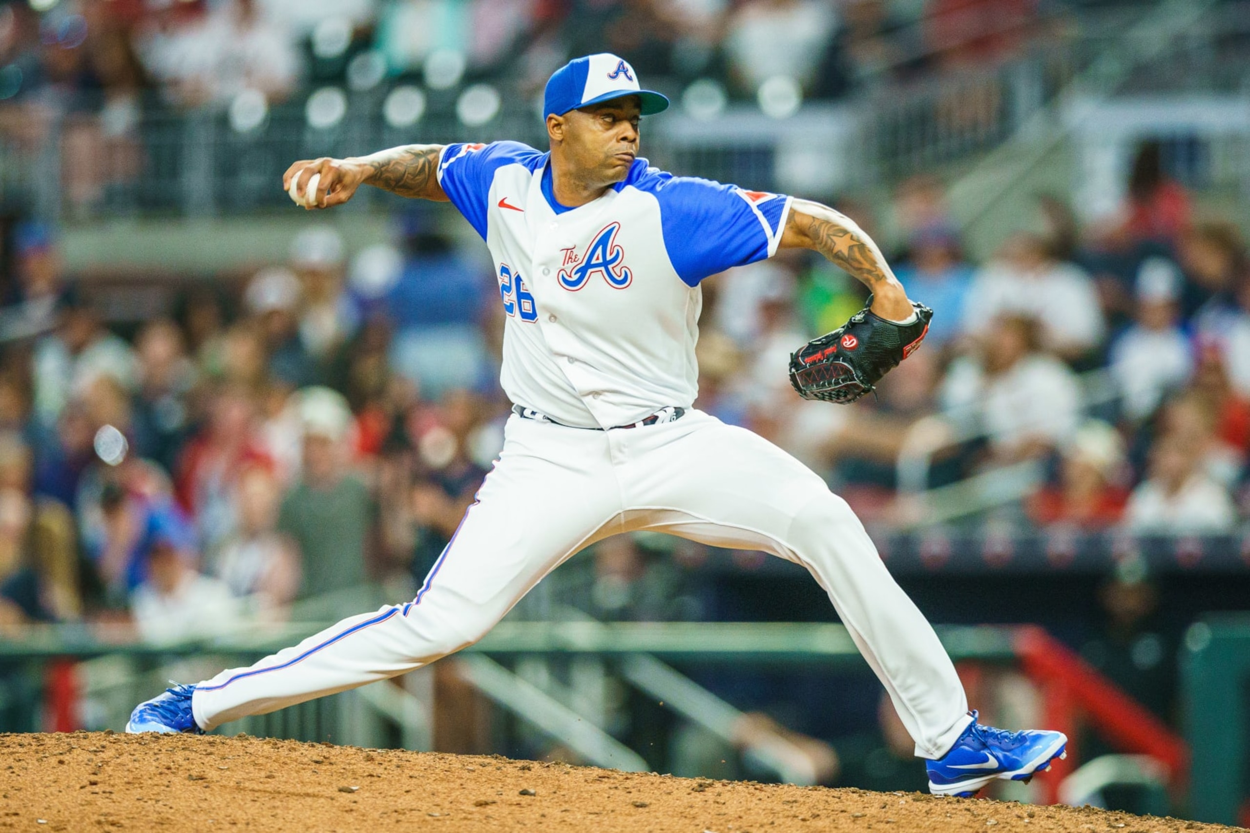 ATLANTA, GA - MAY 6: Raisel Iglesias #26 of the Atlanta Braves pitches during the ninth inning of the game between the Atlanta Braves and the Baltimore Orioles at Truist Park on May 6, 2023 in Atlanta, Georgia. (Photo by Matthew Grimes Jr./Atlanta Braves/Getty Images)