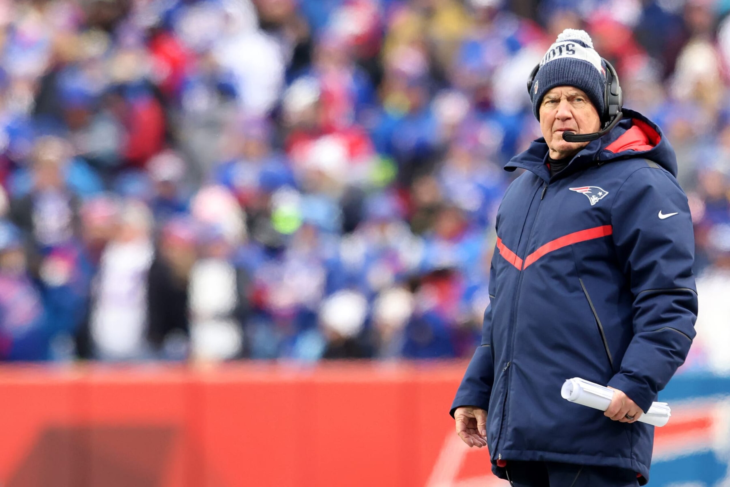 ORCHARD PARK, NEW YORK - JANUARY 08: Head Coach Bill Belichick of the New England Patriots looks on during the second quarter against the Buffalo Bills at Highmark Stadium on January 08, 2023 in Orchard Park, New York. (Photo by Bryan Bennett/Getty Images)
