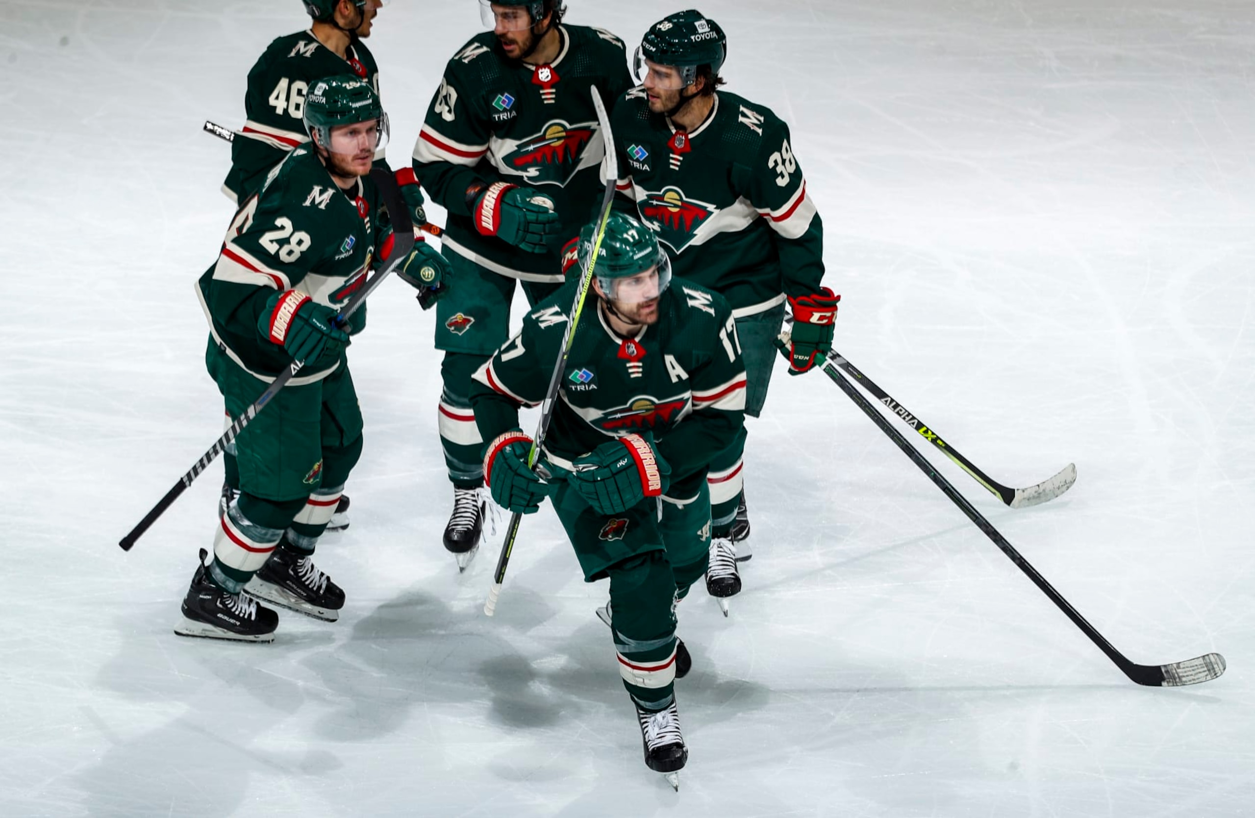 ST PAUL, MN - APRIL 21: Marcus Foligno #17 of the Minnesota Wild huddles with teammates after scoring a goal in the second period of Game Three of the First Round of the 2023 Stanley Cup Playoffs against the Dallas Stars at Xcel Energy Center on April 21, 2023 in St Paul, Minnesota. (Photo by Bruce Kluckhohn/NHLI via Getty Images) ST PAUL, MN - APRIL 21: Marcus Foligno #17 of the Minnesota Wild huddles with teammates after scoring a goal in the second period of Game Three of the First Round of the 2023 Stanley Cup Playoffs against the Dallas Stars at Xcel Energy Center on April 21, 2023 in St Paul, Minnesota. (Photo by Bruce Kluckhohn/NHLI via Getty Images)