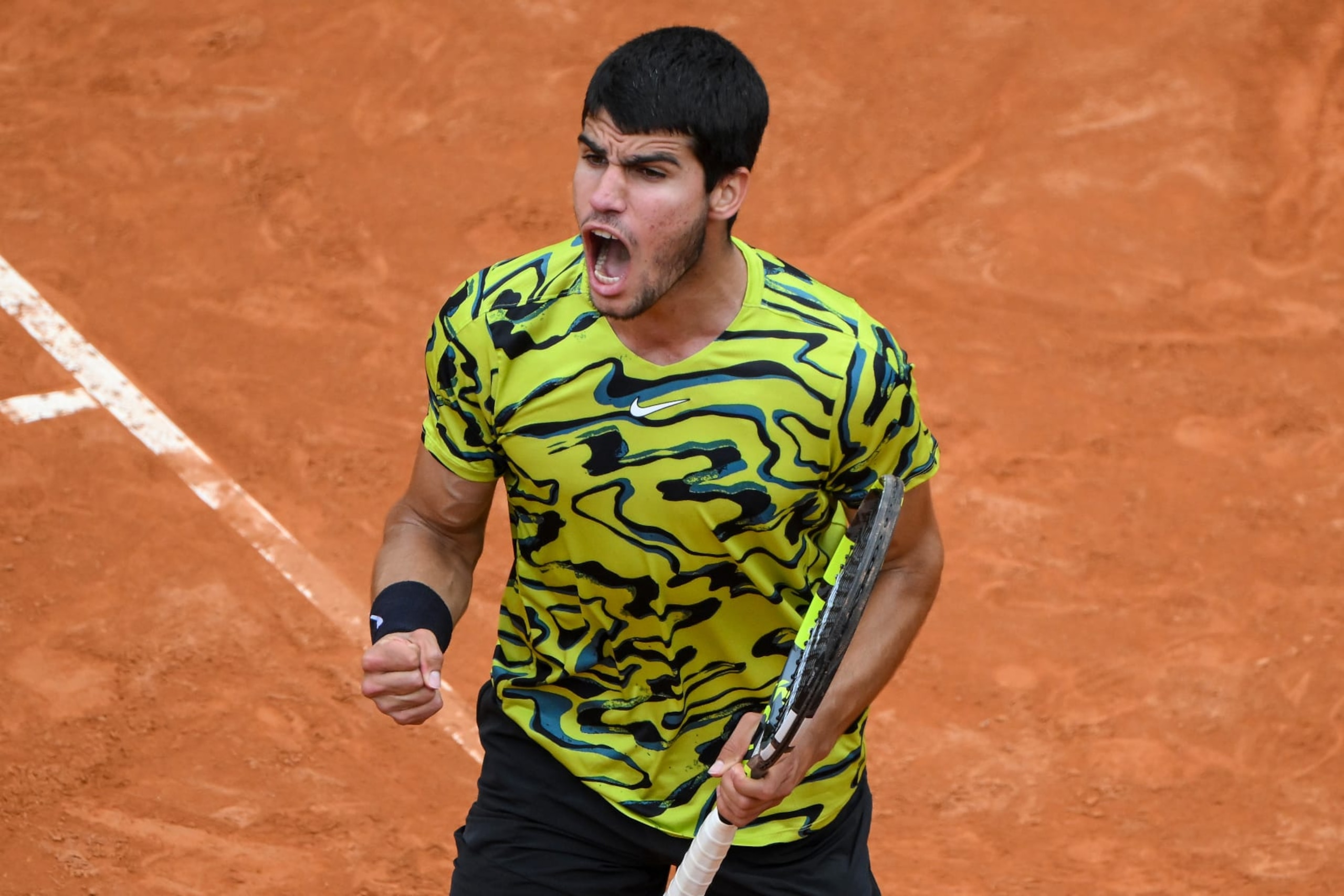 FORO ITALICO, ROME, ITALY - 2023/05/15: Carlos Alcaraz of Spain reacts during his match against Fabian Marozsan of Hungary at the Internazionali BNL d'Italia tennis tournament. Fabian Marozsan won 6-3, 7-6. (Photo by Antonietta Baldassarre/Insidefoto/LightRocket via Getty Images)