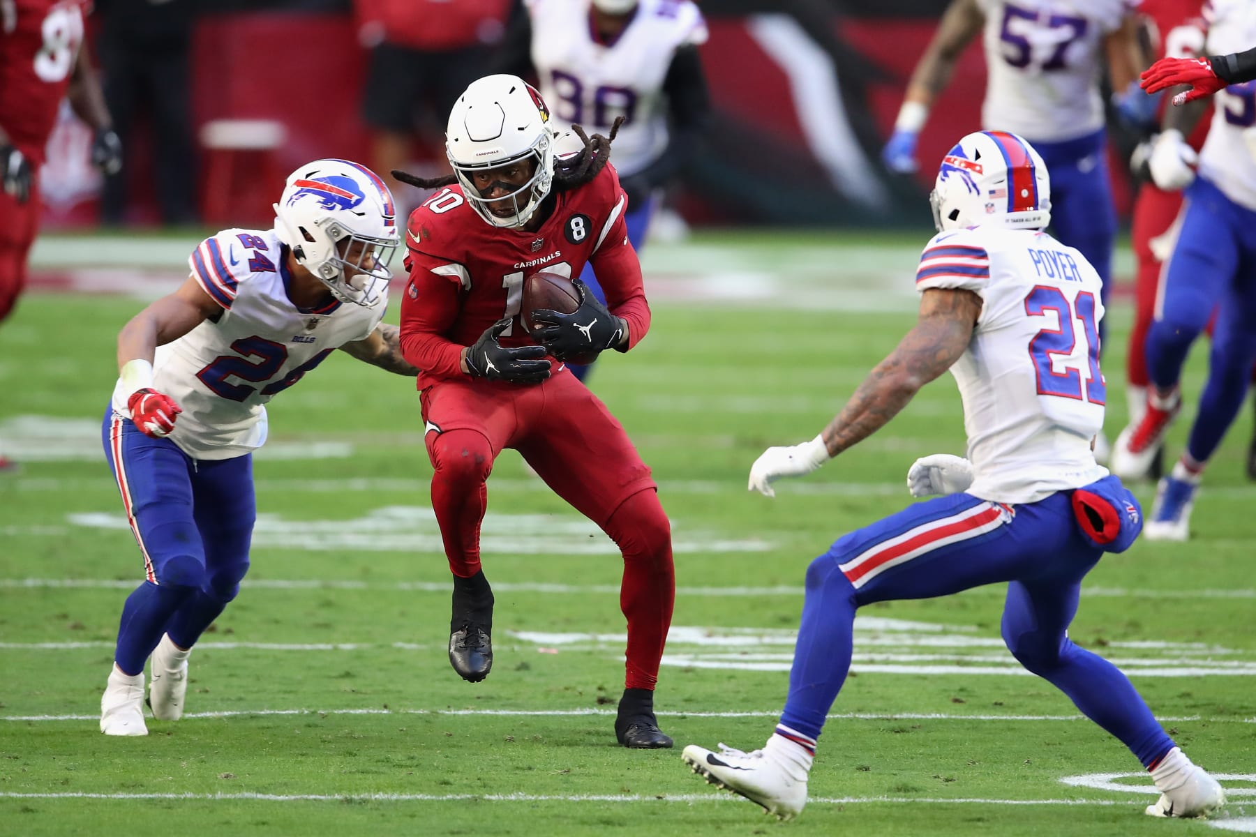 GLENDALE, ARIZONA - NOVEMBER 15: Wide receiver DeAndre Hopkins #10 of the Arizona Cardinals runs with the football after a reception against cornerback Taron Johnson #24 of the Buffalo Bills during the NFL game at State Farm Stadium on November 15, 2020 in Glendale, Arizona. The Cardinals defeated the Bills 32-30.  (Photo by Christian Petersen/Getty Images)