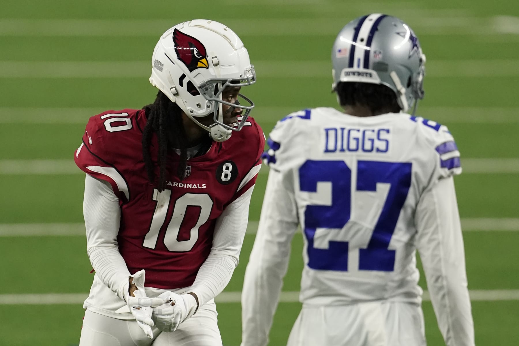 ARLINGTON, TEXAS - OCTOBER 19: DeAndre Hopkins #10 of the Arizona Cardinals and Trevon Diggs #27 of the Dallas Cowboys on the line of scrimmage during an NFL game against the Dallas Cowboys on October 19, 2020 in Arlington, Texas. (Photo by Cooper Neill/Getty Images)