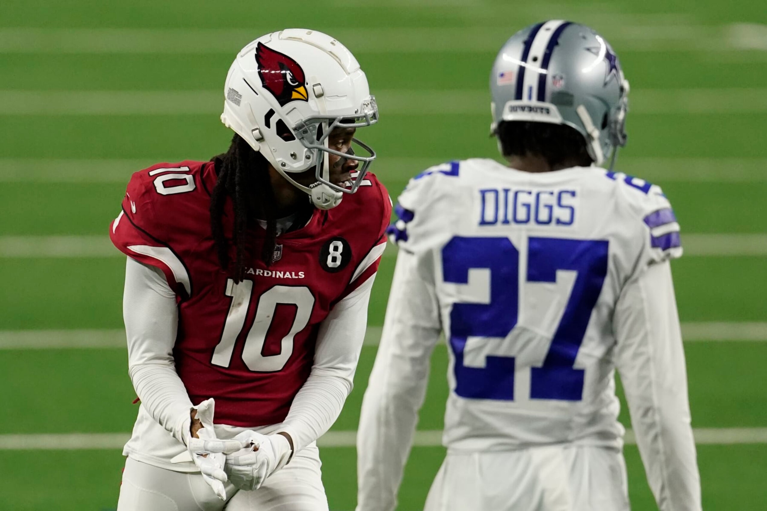 ARLINGTON, TEXAS - OCTOBER 19: DeAndre Hopkins #10 of the Arizona Cardinals and Trevon Diggs #27 of the Dallas Cowboys on the line of scrimmage during an NFL game against the Dallas Cowboys on October 19, 2020 in Arlington, Texas. (Photo by Cooper Neill/Getty Images)