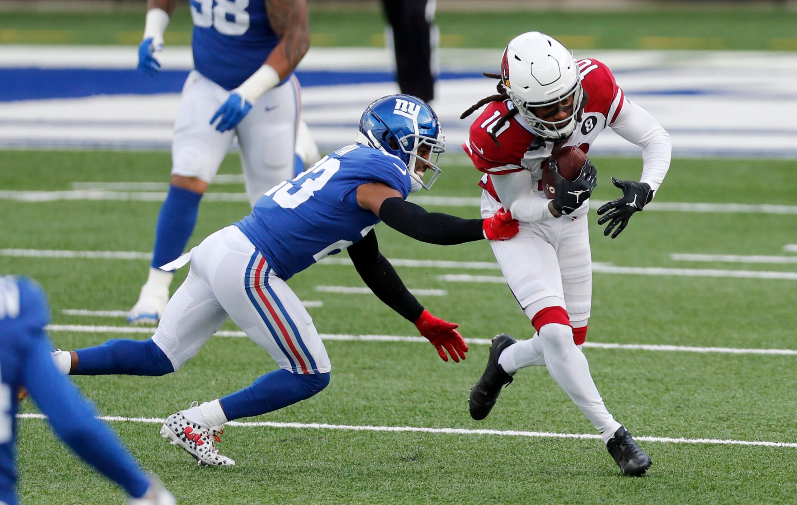 EAST RUTHERFORD, NEW JERSEY - DECEMBER 13: (NEW YORK DAILIES OUT)  DeAndre Hopkins #10 of the Arizona Cardinals in action against Logan Ryan #23 of the New York Giants at MetLife Stadium on December 13, 2020 in East Rutherford, New Jersey. The Cardinals defeated the Giants 26-7. (Photo by Jim McIsaac/Getty Images)