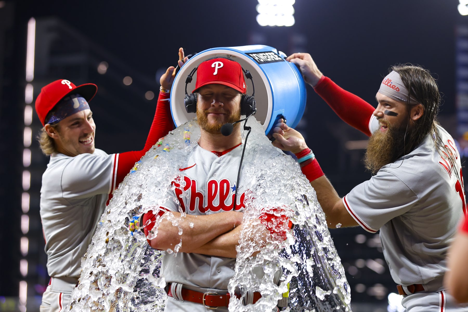ATLANTA, GA - MAY 26: Craig Kimbrel #31 of the Philadelphia Phillies is dunked with water by Bryson Stott #5 and Brandon Marsh #16 after recording his 400th save against the Atlanta Braves at Truist Park on May 26, 2023 in Atlanta, Georgia. (Photo by Todd Kirkland/Getty Images)