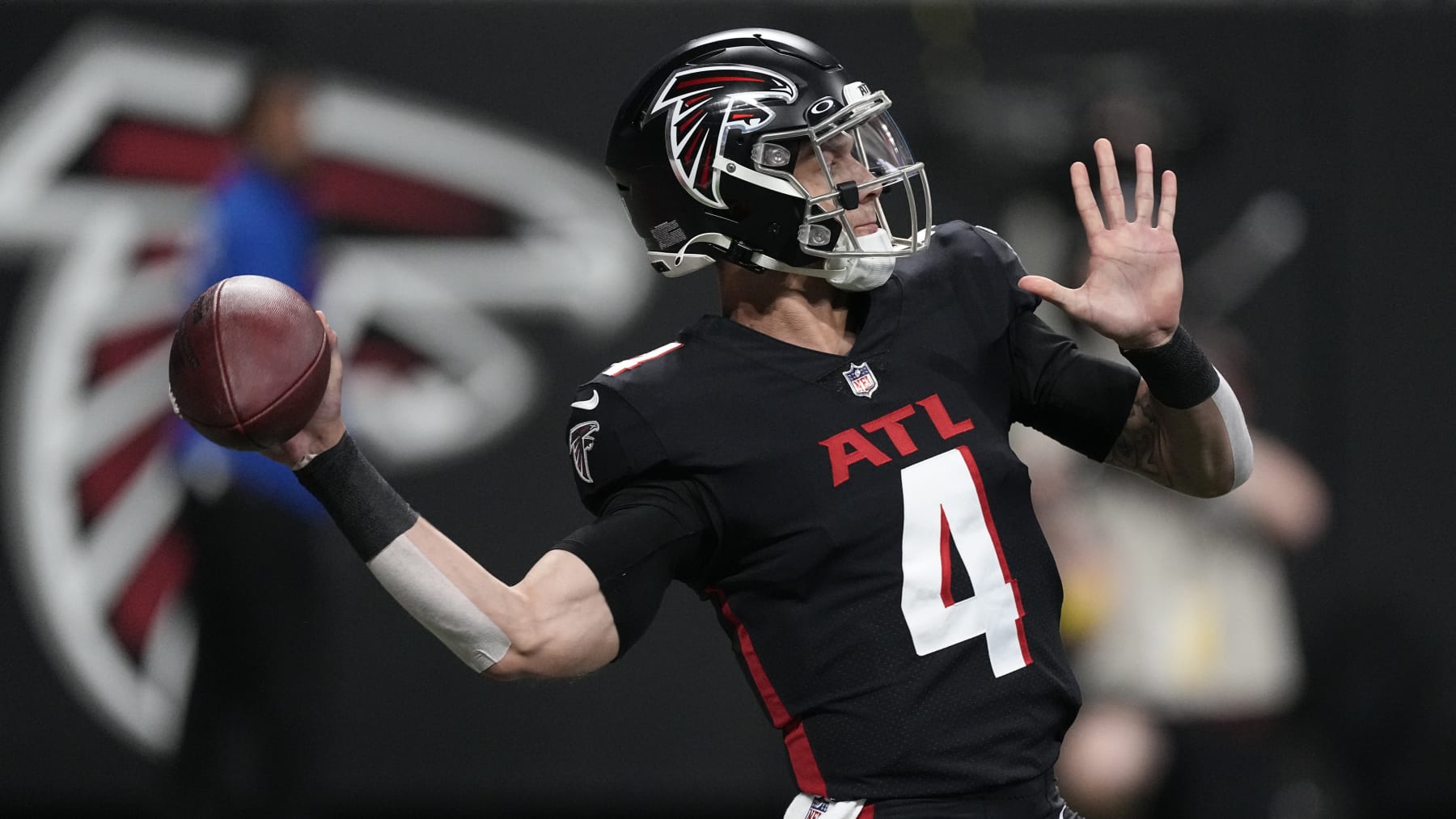 Atlanta Falcons quarterback Desmond Ridder (4) throws a pass during an NFL football game against the Tampa Bay Buccaneers Sunday, Jan. 8, 2023, in Atlanta. (AP Photo/John Bazemore)