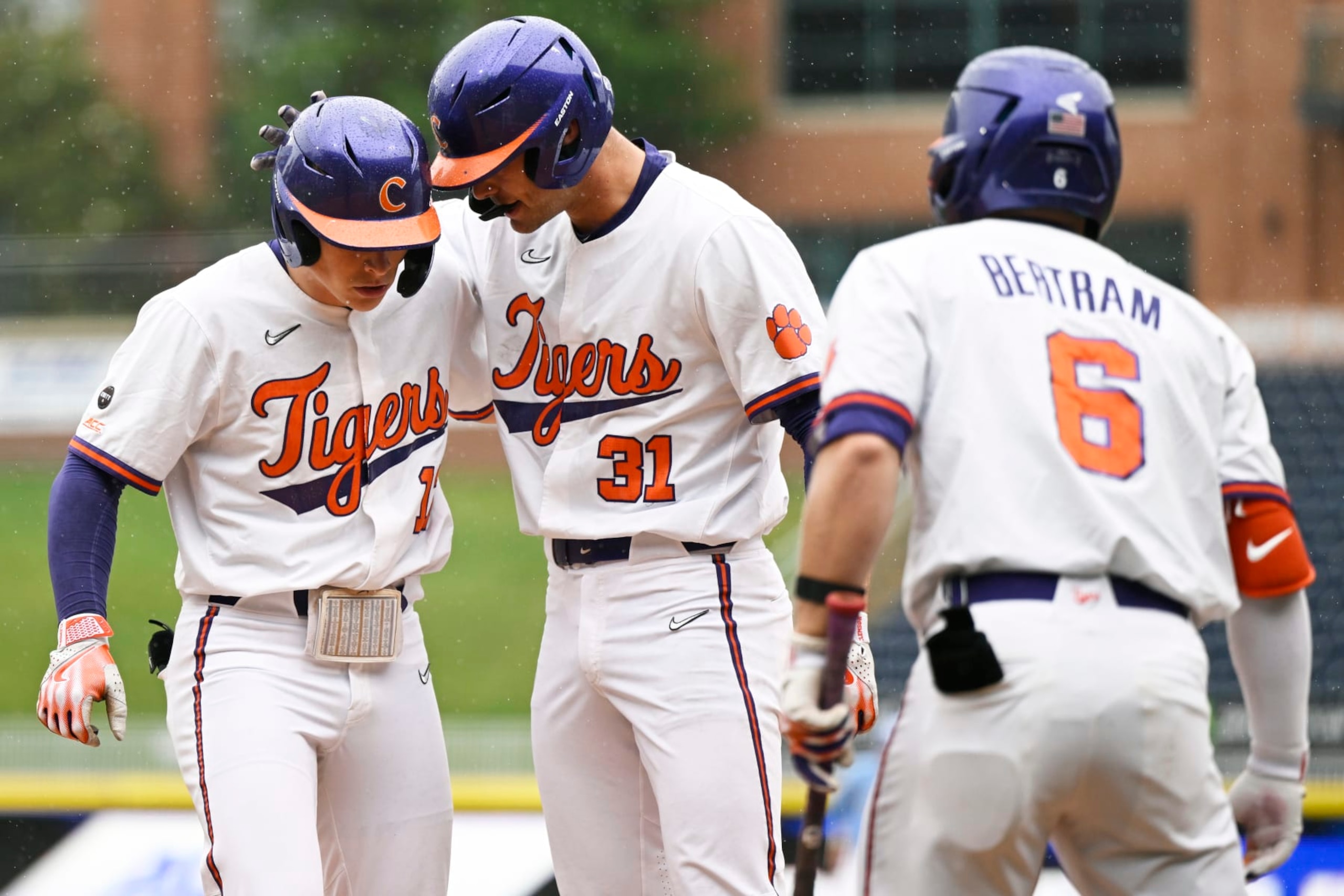 DURHAM, NORTH CAROLINA - MAY 27: Billy Amick #17, Caden Grice #31, and Riley Bertram #6 of the Clemson Tigers celebrate Amick's home run against the North Carolina Tar Heels in the first inning during the semifinals of the ACC Baseball Championship at Durham Bulls Athletic Park on May 27, 2023 in Durham, North Carolina. (Photo by Eakin Howard/Getty Images)
