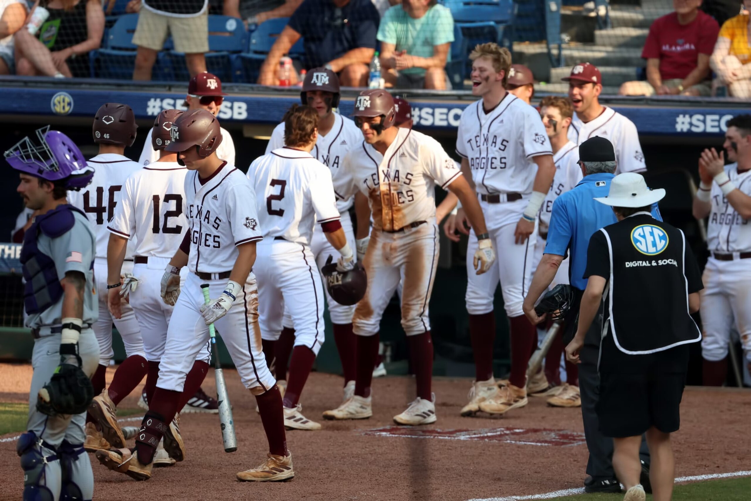 HOOVER, AL - MAY 26: Texas A&M Aggies players congratulate Texas A&M Aggies infielder Hunter Haas (2) during the 2023 SEC Baseball Tournament game between the LSU Tigers and the Texas A&M Aggies on May 26, 2023 at Hoover Metropolitan Stadium in Hoover, Alabama. (Photo by Michael Wade/Icon Sportswire via Getty Images) HOOVER, AL - MAY 26: Texas A&M Aggies players congratulate Texas A&M Aggies infielder Hunter Haas (2) during the 2023 SEC Baseball Tournament game between the LSU Tigers and the Texas A&M Aggies on May 26, 2023 at Hoover Metropolitan Stadium in Hoover, Alabama. (Photo by Michael Wade/Icon Sportswire via Getty Images)