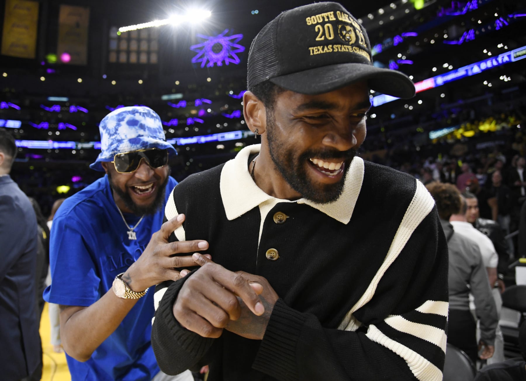LOS ANGELES, CA - APRIL 28: Tee Morant, father of Ja Morant #12 of the Memphis Grizzlies, and Kyrie Irving #2 of the Dallas Mavericks attend a basketball game between Los Angeles Lakers and Memphis Grizzlies Round 1 Game 6 of the 2023 NBA Playoffs against Los Angeles Lakers at Crypto.com Arena on April 28, 2023 in Los Angeles, California. (Photo by Kevork Djansezian/Getty Images)