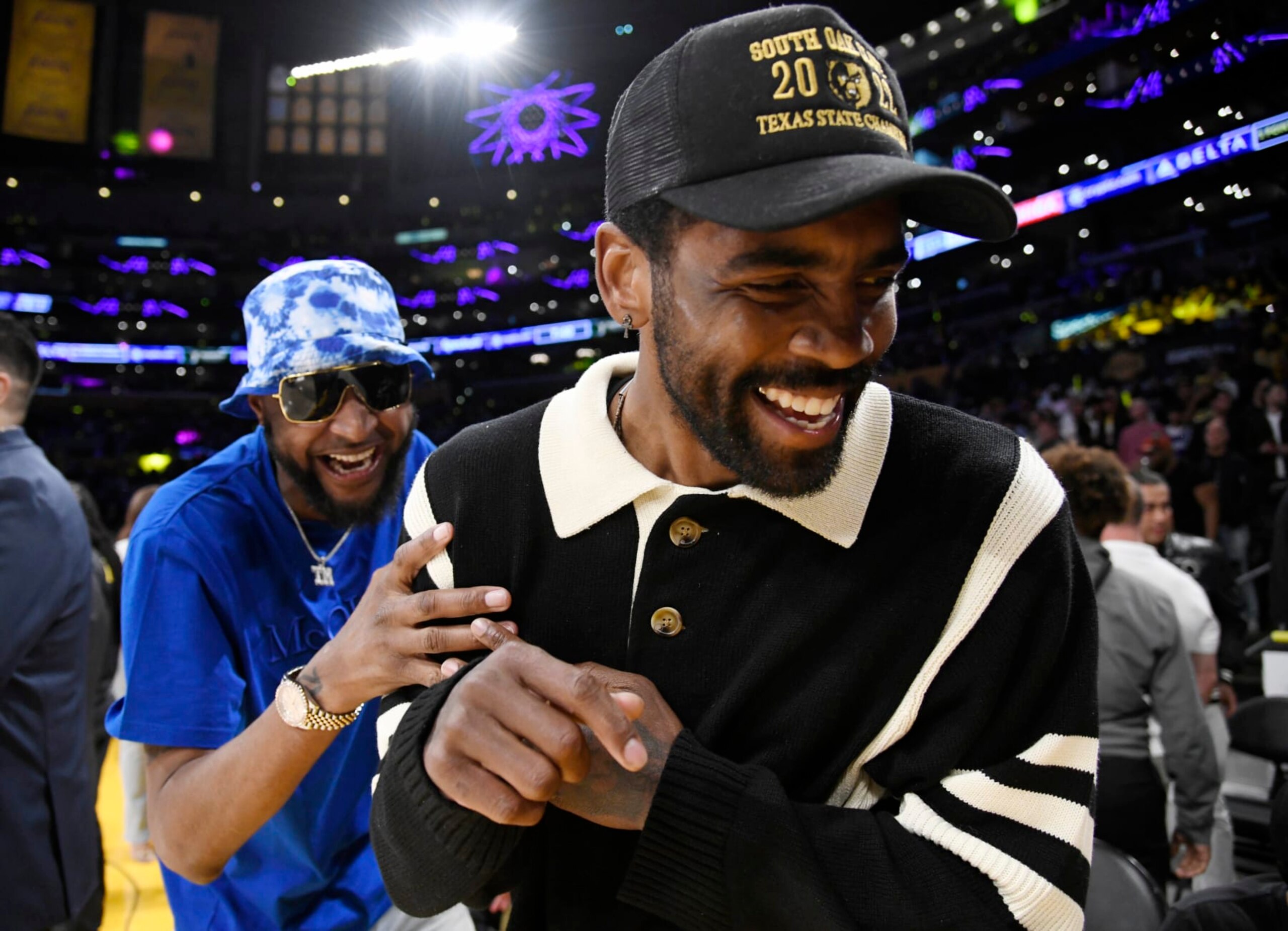 LOS ANGELES, CA - APRIL 28: Tee Morant, father of Ja Morant #12 of the Memphis Grizzlies, and Kyrie Irving #2 of the Dallas Mavericks attend a basketball game between Los Angeles Lakers and Memphis Grizzlies Round 1 Game 6 of the 2023 NBA Playoffs against Los Angeles Lakers at Crypto.com Arena on April 28, 2023 in Los Angeles, California. (Photo by Kevork Djansezian/Getty Images)