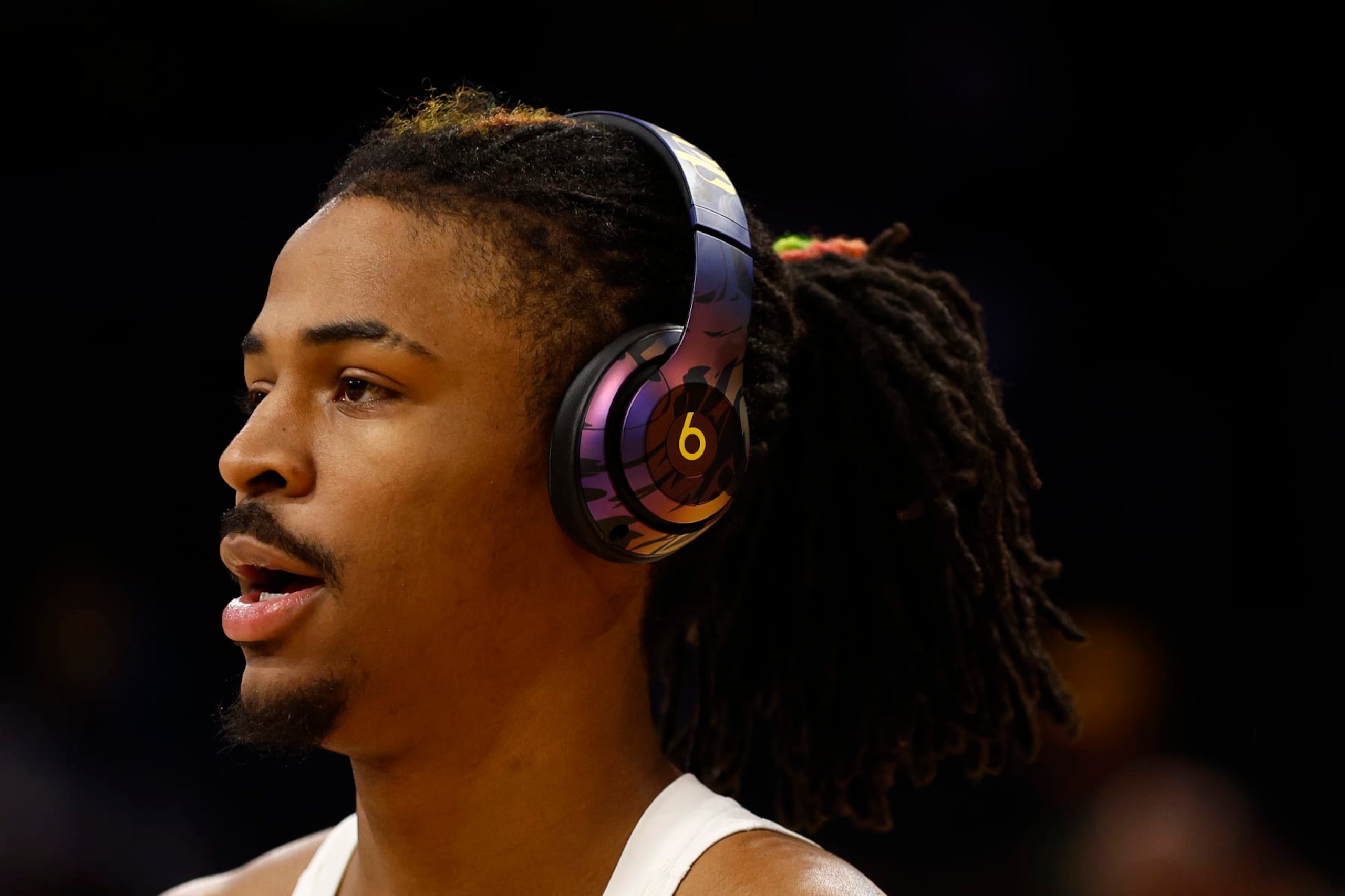 LOS ANGELES, CALIFORNIA - APRIL 28:  Ja Morant #12 of the Memphis Grizzlies warms up before play against the Los Angeles Lakers in Game Six of the Western Conference First Round Playoffs at Crypto.com Arena on April 28, 2023 in Los Angeles, California.  NOTE TO USER: User expressly acknowledges and agrees that, by downloading and/or using this photograph, user is consenting to the terms and conditions of the Getty Images License Agreement. (Photo by Ronald Martinez/Getty Images)