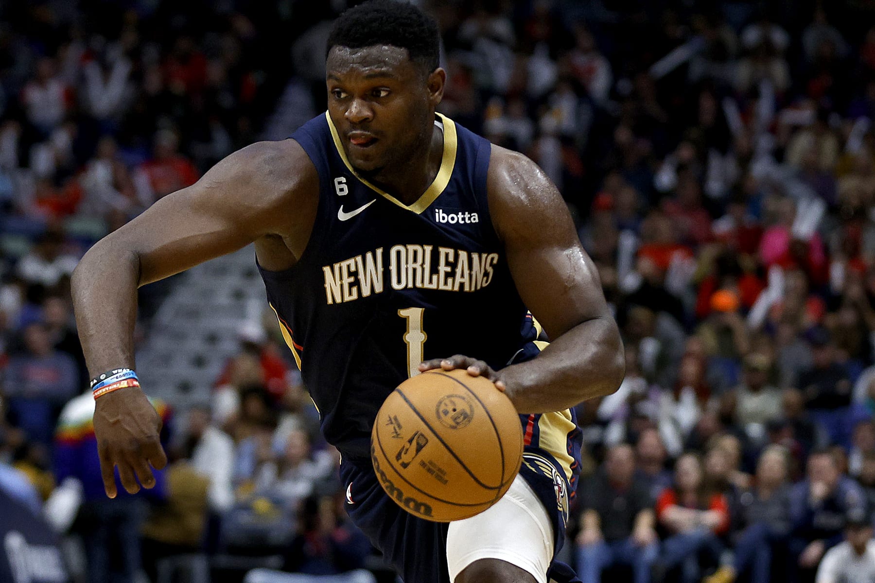 NEW ORLEANS, LOUISIANA - DECEMBER 28: Zion Williamson #1 of the New Orleans Pelicans dribbles the ball down court during the third quarter of an NBA game against the Minnesota Timberwolves at Smoothie King Center on December 28, 2022 in New Orleans, Louisiana. NOTE TO USER: User expressly acknowledges and agrees that, by downloading and or using this photograph, User is consenting to the terms and conditions of the Getty Images License Agreement. (Photo by Sean Gardner/Getty Images)