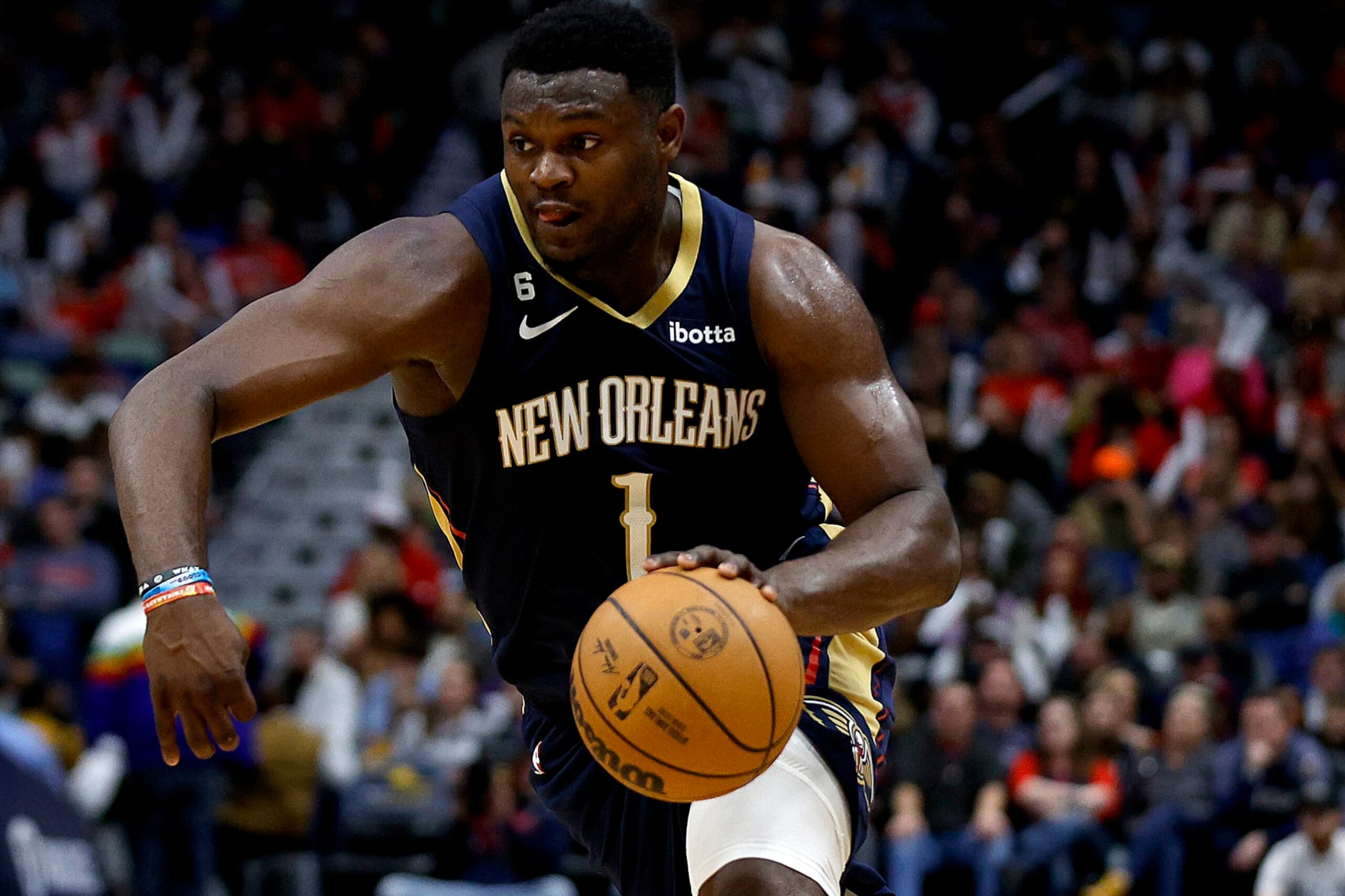 NEW ORLEANS, LOUISIANA - DECEMBER 28: Zion Williamson #1 of the New Orleans Pelicans dribbles the ball down court during the third quarter of an NBA game against the Minnesota Timberwolves at Smoothie King Center on December 28, 2022 in New Orleans, Louisiana. NOTE TO USER: User expressly acknowledges and agrees that, by downloading and or using this photograph, User is consenting to the terms and conditions of the Getty Images License Agreement. (Photo by Sean Gardner/Getty Images)