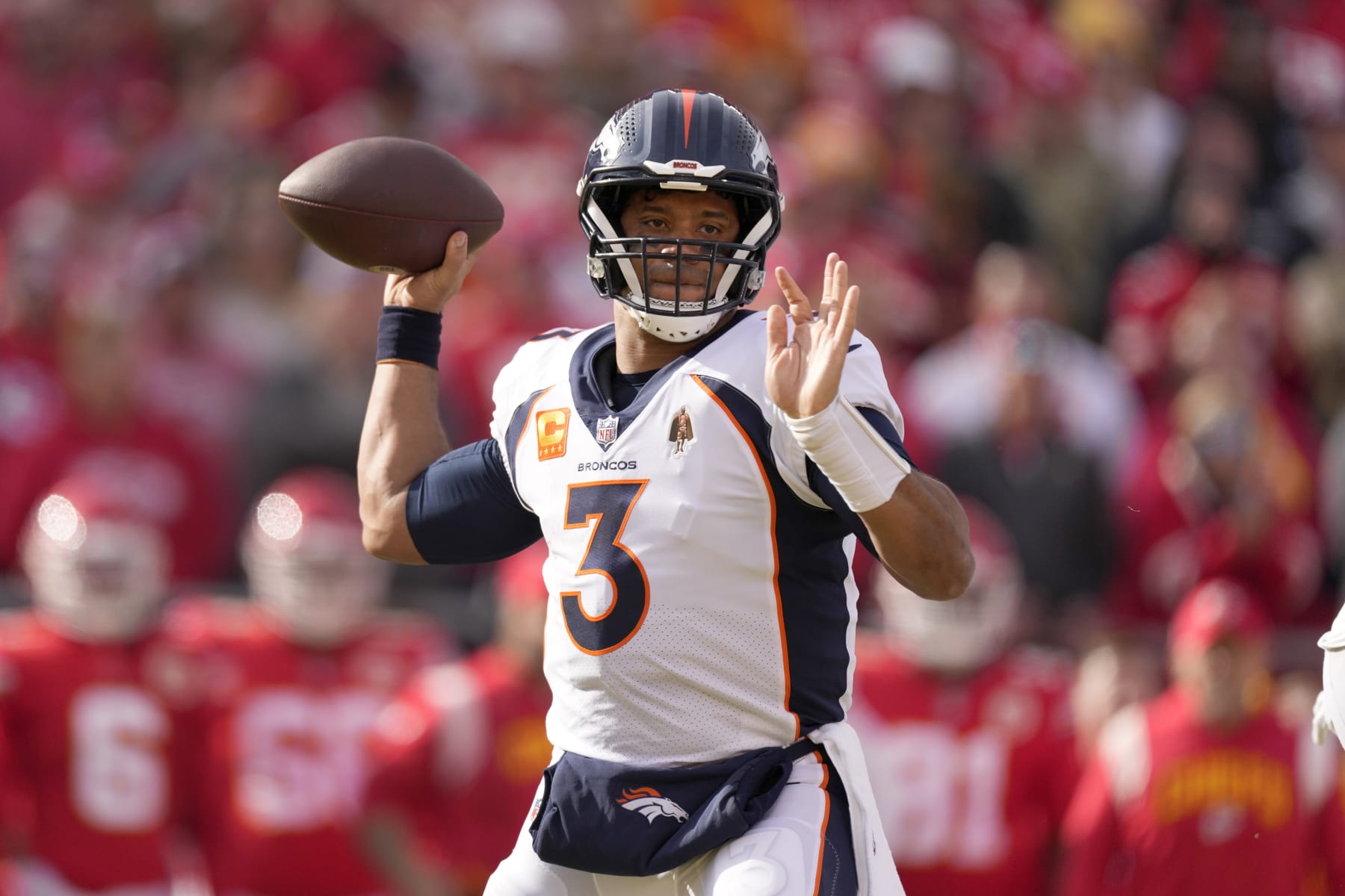 Denver Broncos quarterback Russell Wilson throws during the first half of an NFL football game against the Kansas City Chiefs Sunday, Jan. 1, 2023, in Kansas City, Mo. (AP Photo/Charlie Riedel)