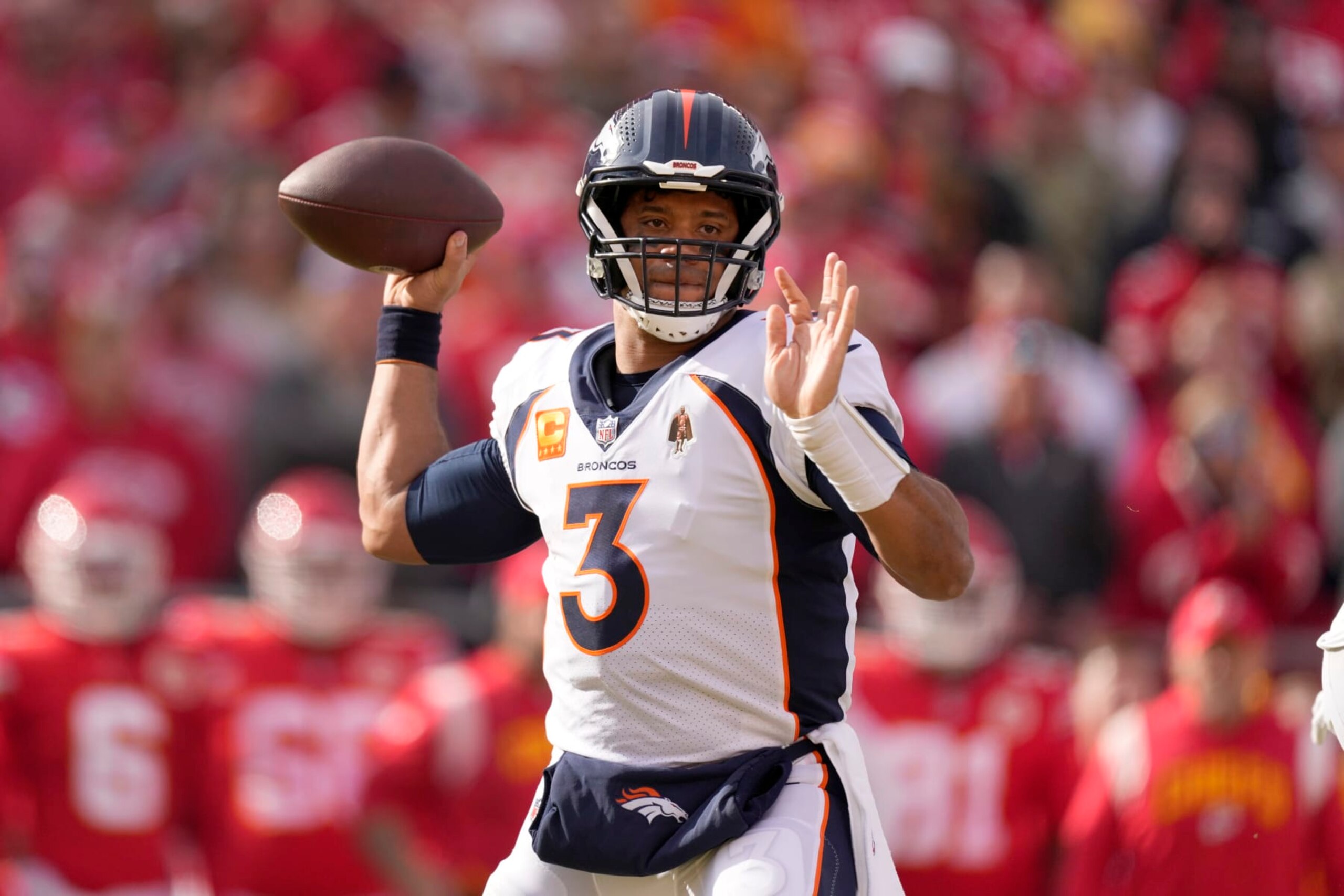 Denver Broncos quarterback Russell Wilson throws during the first half of an NFL football game against the Kansas City Chiefs Sunday, Jan. 1, 2023, in Kansas City, Mo. (AP Photo/Charlie Riedel)