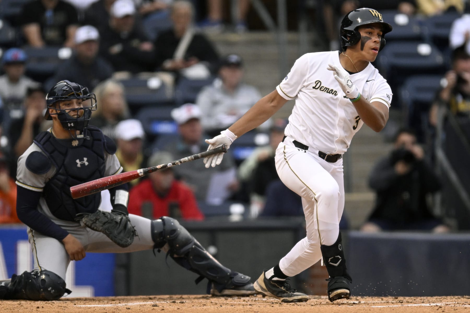DURHAM, NORTH CAROLINA - MAY 26: Danny Corona #3 of the Wake Forest Demon Deacons watches his hit against the Notre Dame Fighting Irish in the second inning during the ACC Baseball Championship at Durham Bulls Athletic Park on May 26, 2023 in Durham, North Carolina. (Photo by Eakin Howard/Getty Images)
