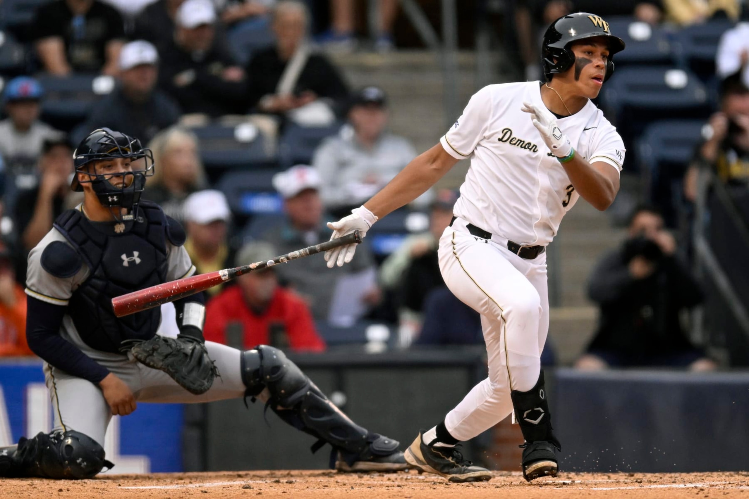 DURHAM, NORTH CAROLINA - MAY 26: Danny Corona #3 of the Wake Forest Demon Deacons watches his hit against the Notre Dame Fighting Irish in the second inning during the ACC Baseball Championship at Durham Bulls Athletic Park on May 26, 2023 in Durham, North Carolina. (Photo by Eakin Howard/Getty Images)