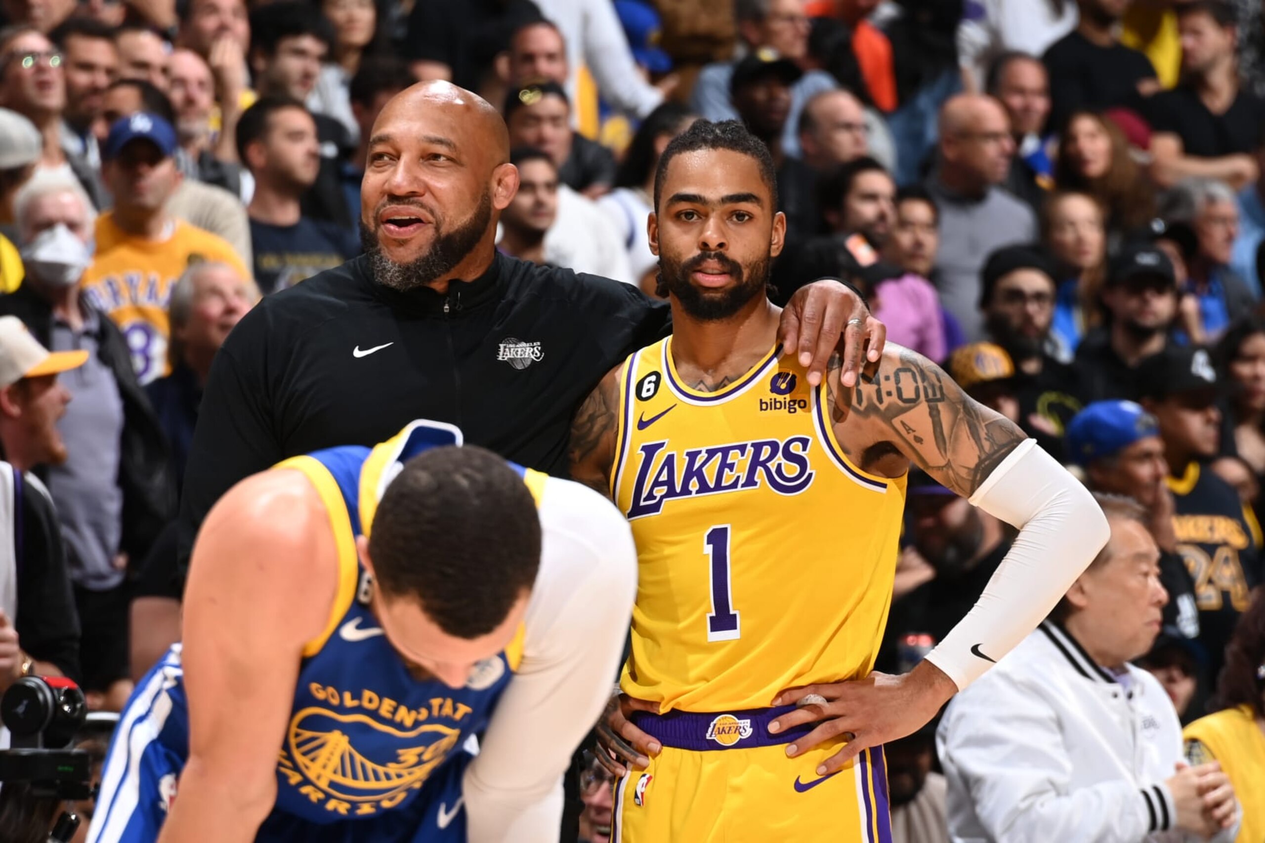 LOS ANGELES, CA - MAY 12: Head Coach Darvin Ham of the Los Angeles Lakers and D'Angelo Russell #1 look on during Game 6 of the Western Conference Semi-Finals 2023 NBA Playoffs on May 12, 2023 at Crypto.Com Arena in Los Angeles, California. NOTE TO USER: User expressly acknowledges and agrees that, by downloading and/or using this Photograph, user is consenting to the terms and conditions of the Getty Images License Agreement. Mandatory Copyright Notice: Copyright 2023 NBAE (Photo by Andrew D. Bernstein/NBAE via Getty Images)