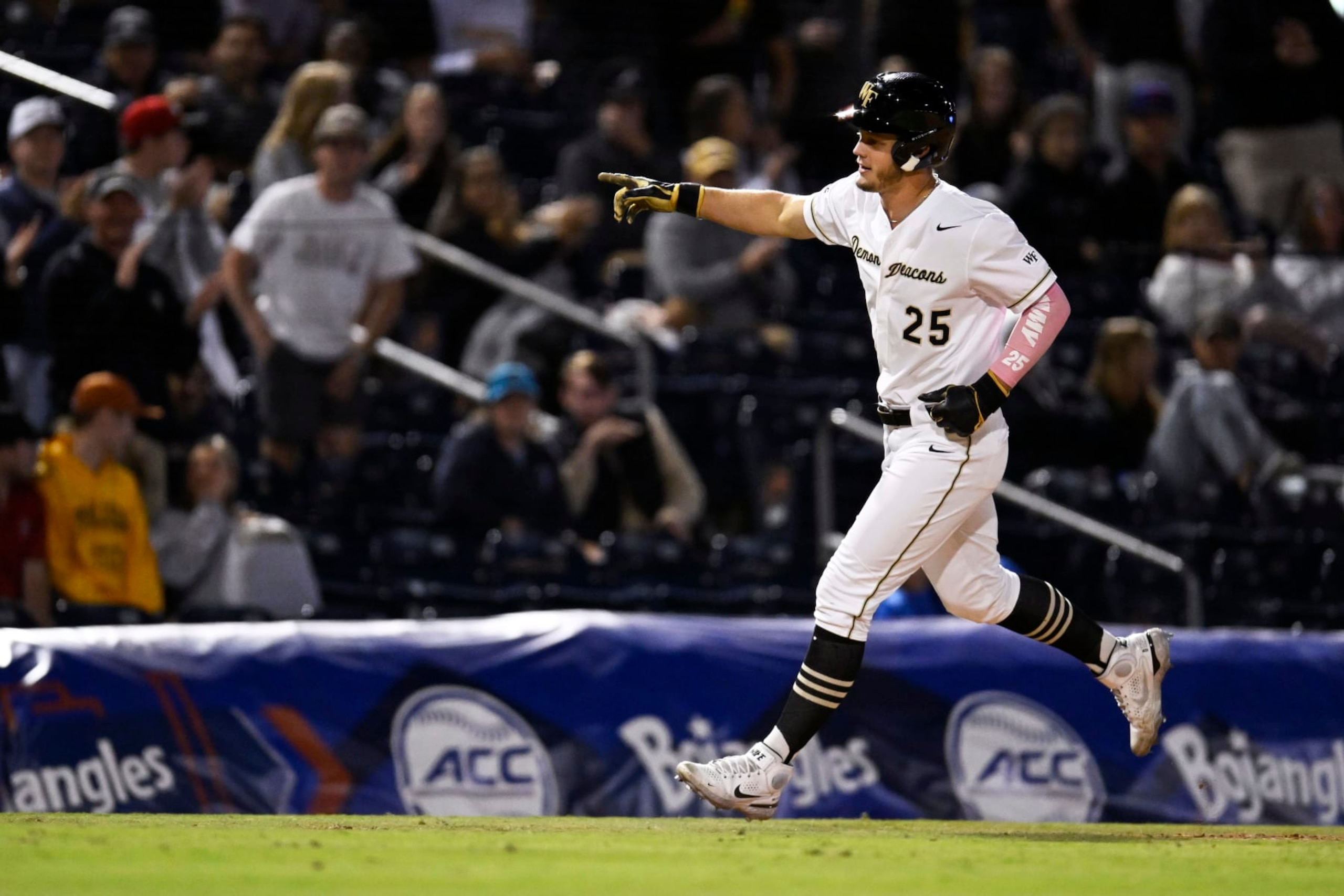 DURHAM, NORTH CAROLINA - MAY 26: Brock Wilken #25 of the Wake Forest Demon Deacons celebrates his home run against the Notre Dame Fighting Irish in the eighth inning during the ACC Baseball Championship at Durham Bulls Athletic Park on May 26, 2023 in Durham, North Carolina. (Photo by Eakin Howard/Getty Images)