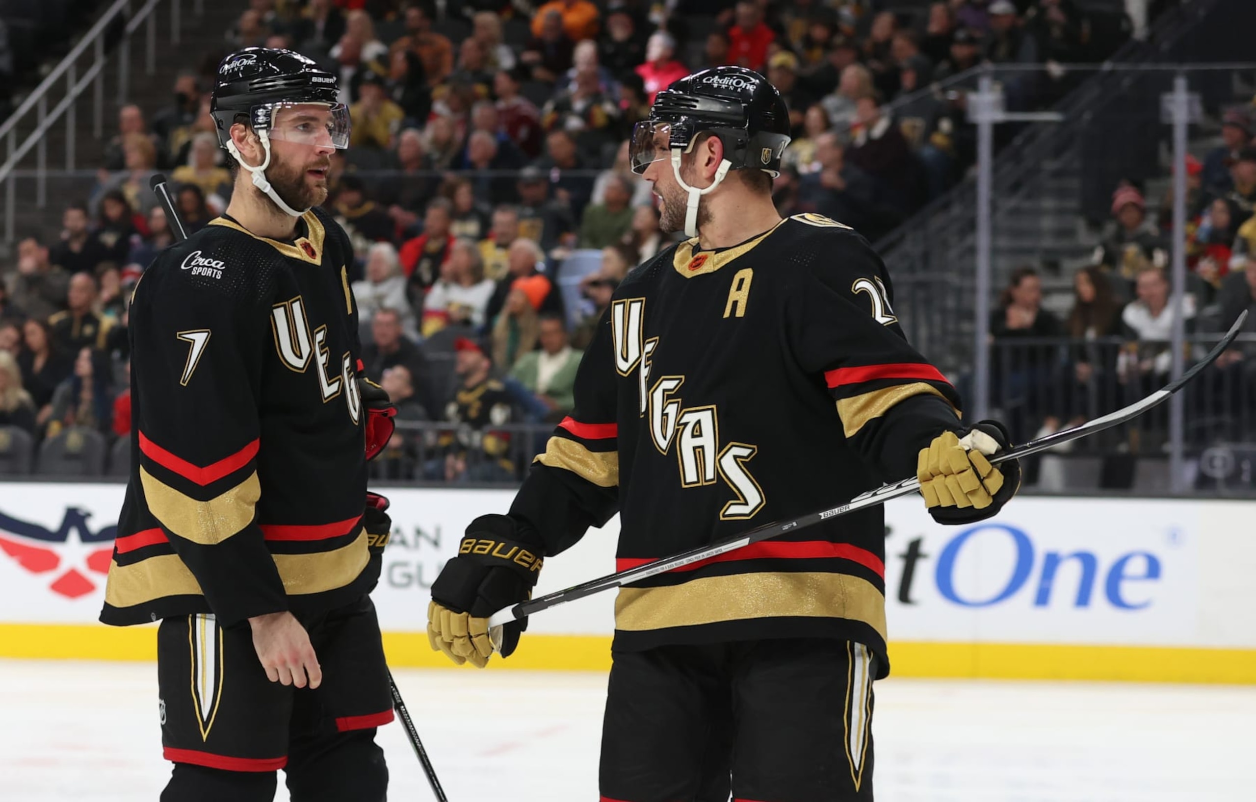 LAS VEGAS, NEVADA - JANUARY 21: (L-R) Alex Pietrangelo #7 and Alec Martinez #23 of the Vegas Golden Knights talk during the second period against the Washington Capitals at T-Mobile Arena on January 21, 2023 in Las Vegas, Nevada. (Photo by Zak Krill/NHLI via Getty Images)