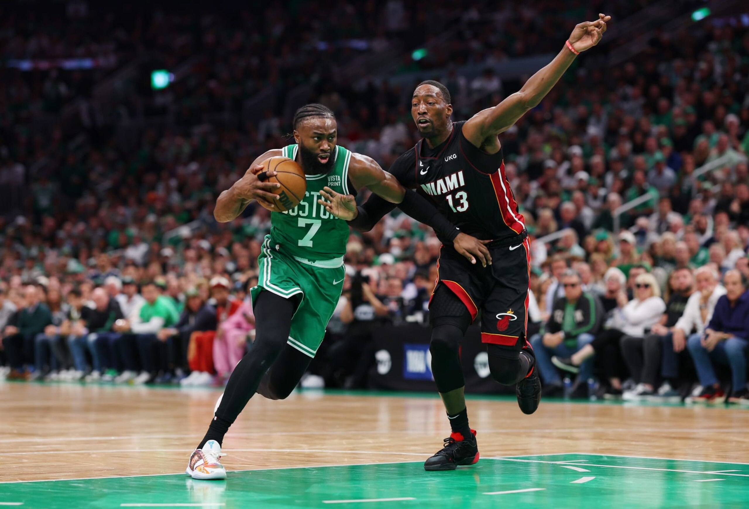 BOSTON, MASSACHUSETTS - MAY 29: Jaylen Brown #7 of the Boston Celtics drives to the basket against Bam Adebayo #13 of the Miami Heat during the first quarter in game seven of the Eastern Conference Finals at TD Garden on May 29, 2023 in Boston, Massachusetts. NOTE TO USER: User expressly acknowledges and agrees that, by downloading and or using this photograph, User is consenting to the terms and conditions of the Getty Images License Agreement. (Photo by Maddie Meyer/Getty Images)