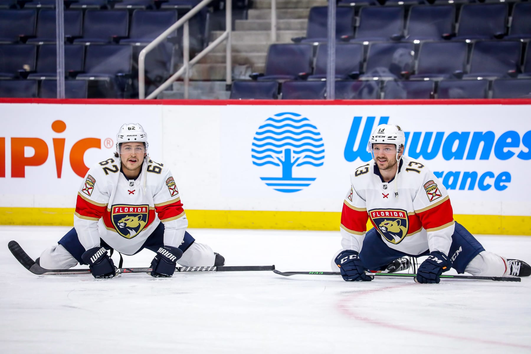 WINNIPEG, MB - JANUARY 25: Brandon Montour #62 and Sam Reinhart #13 of the Florida Panthers take part in the pre-game warm up prior to NHL action against the Winnipeg Jets at the Canada Life Centre on January 25, 2022 in Winnipeg, Manitoba, Canada. (Photo by Darcy Finley/NHLI via Getty Images)