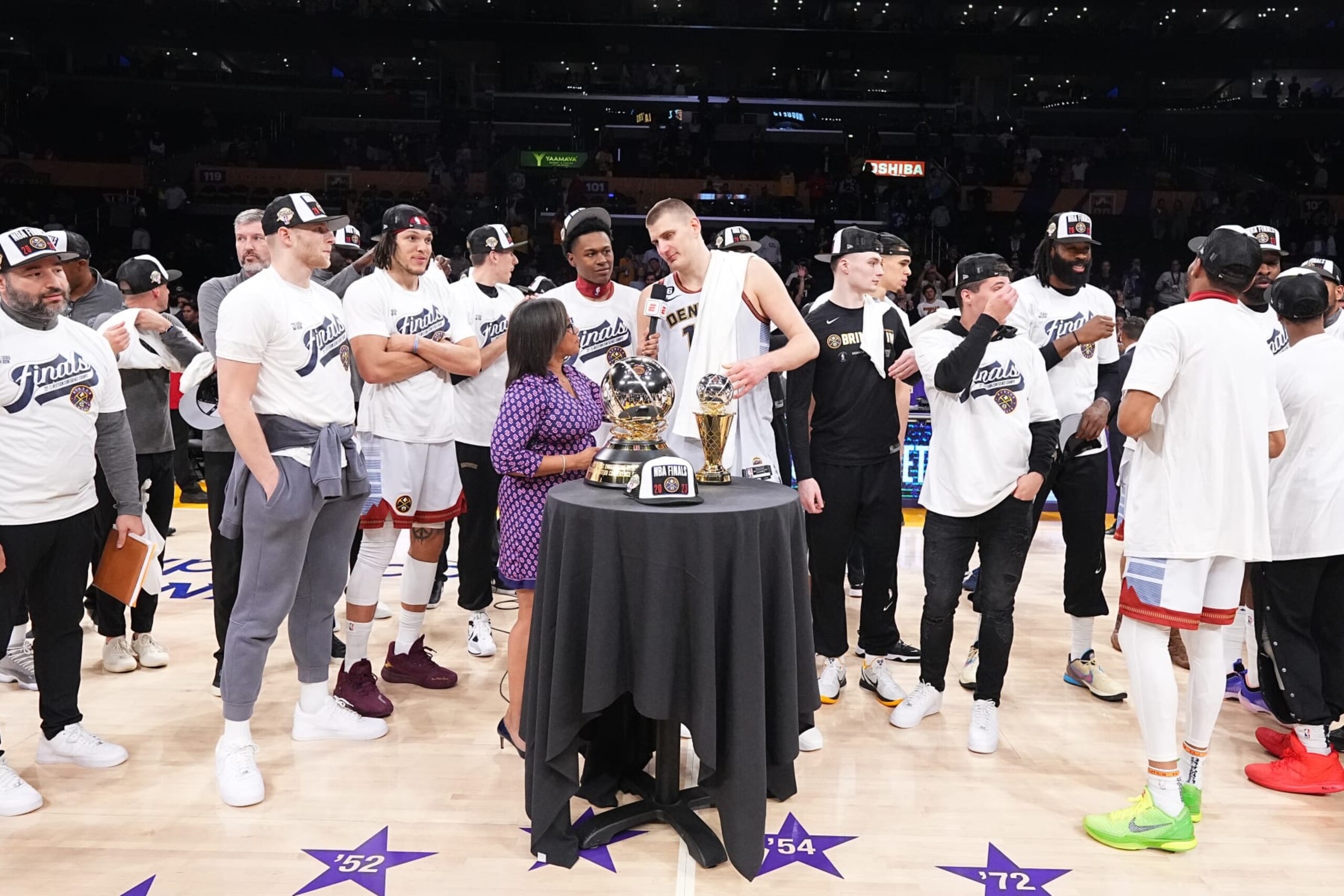 LOS ANGELES, CA - MAY 22: Nikola Jokic #15 of the Denver Nuggets is presented with the Earvin "Magic" Johnson Western Conference Finals Most Valuable Player trophy after winning Game Four of the Western Conference Finals against the Los Angeles Lakers on May 22, 2023 at Crypto.com Arena in Los Angeles, California. NOTE TO USER: User expressly acknowledges and agrees that, by downloading and/or using this Photograph, user is consenting to the terms and conditions of the Getty Images License Agreement. Mandatory Copyright Notice: Copyright 2023 NBAE (Photo by Garrett Ellwood/NBAE via Getty Images)