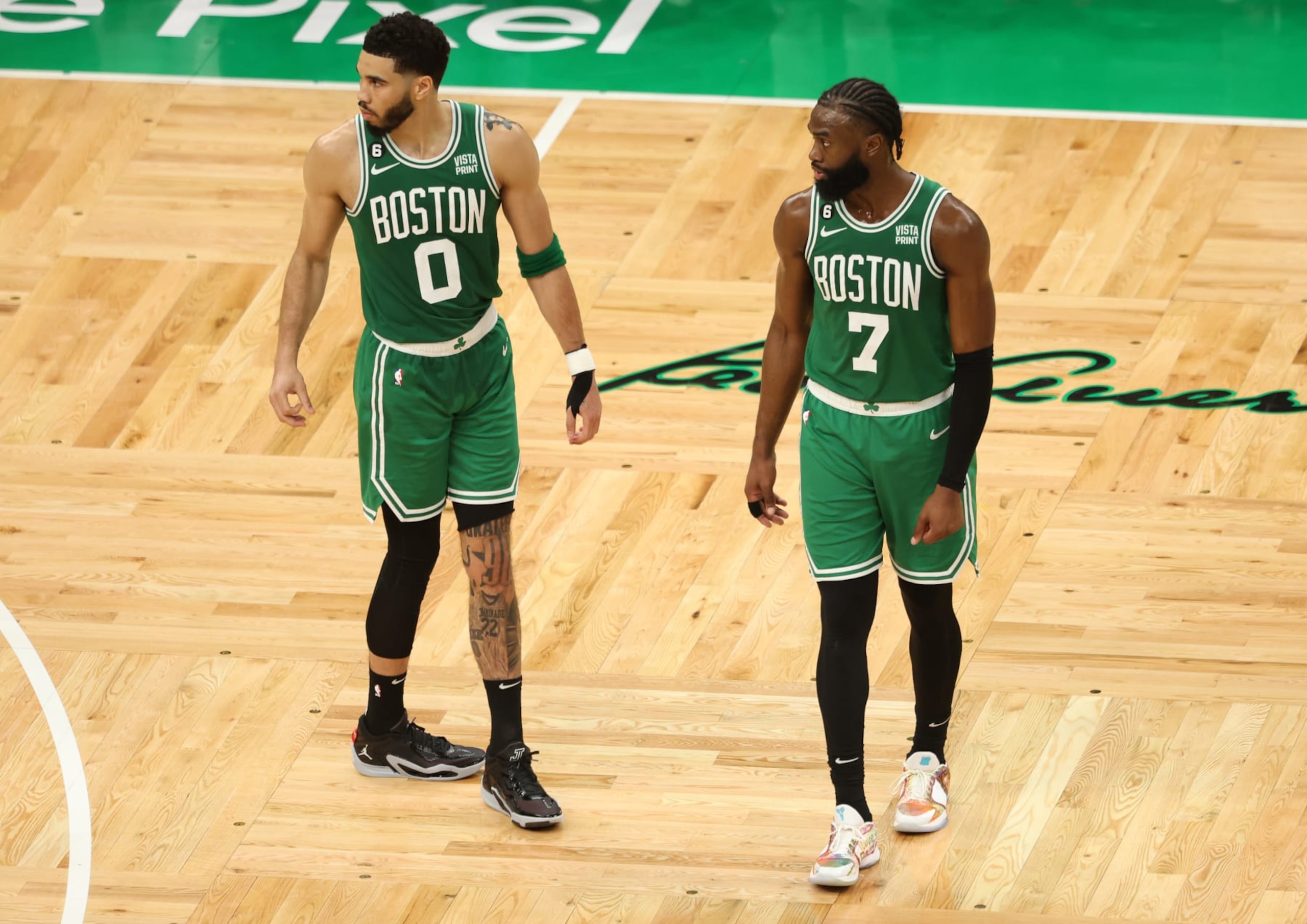 BOSTON, MASSACHUSETTS - MAY 29: Jayson Tatum #0 of the Boston Celtics stands next to Jaylen Brown #7 during the third quarter against the Miami Heat in game seven of the Eastern Conference Finals at TD Garden on May 29, 2023 in Boston, Massachusetts. NOTE TO USER: User expressly acknowledges and agrees that, by downloading and or using this photograph, User is consenting to the terms and conditions of the Getty Images License Agreement. (Photo by Adam Glanzman/Getty Images)