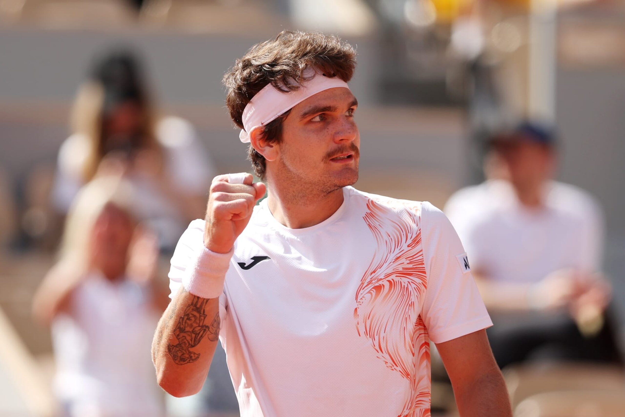 PARIS, FRANCE - MAY 30: Thiago Seyboth Wild of Brazil celebrates a point against Daniil Medvedev during their Men's Singles First Round Match on Day Three of the 2023 French Open at Roland Garros on May 30, 2023 in Paris, France. (Photo by Julian Finney/Getty Images)