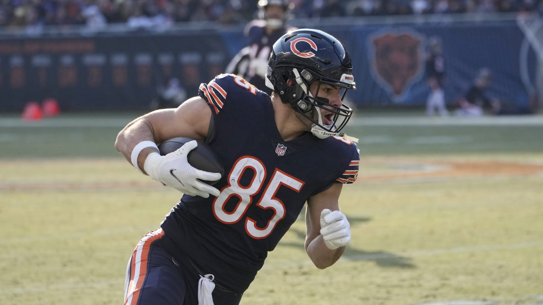Chicago Bears tight end Cole Kmet runs up field after catching a pass during the second half of an NFL football game against the Minnesota Vikings, Sunday, Jan. 8, 2023, in Chicago. (AP Photo/Charles Rex Arbogast)
