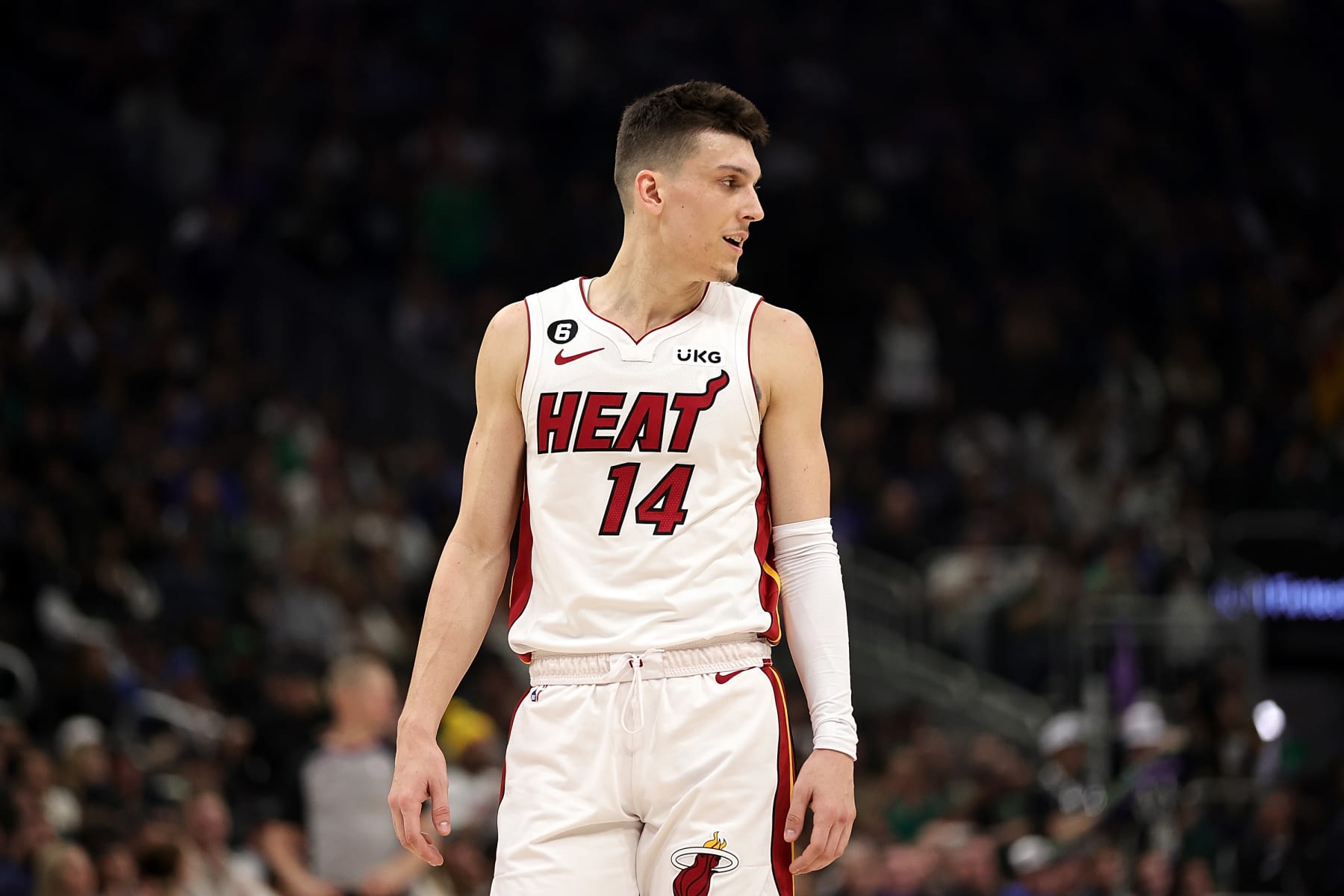MILWAUKEE, WISCONSIN - APRIL 16: Tyler Herro #14 of the Miami Heat walks backcourt during the first half of Game One of the Eastern Conference First Round Playoffs against the Milwaukee Bucks at Fiserv Forum on April 16, 2023 in Milwaukee, Wisconsin. NOTE TO USER: User expressly acknowledges and agrees that, by downloading and or using this photograph, User is consenting to the terms and conditions of the Getty Images License Agreement. (Photo by Stacy Revere/Getty Images)
