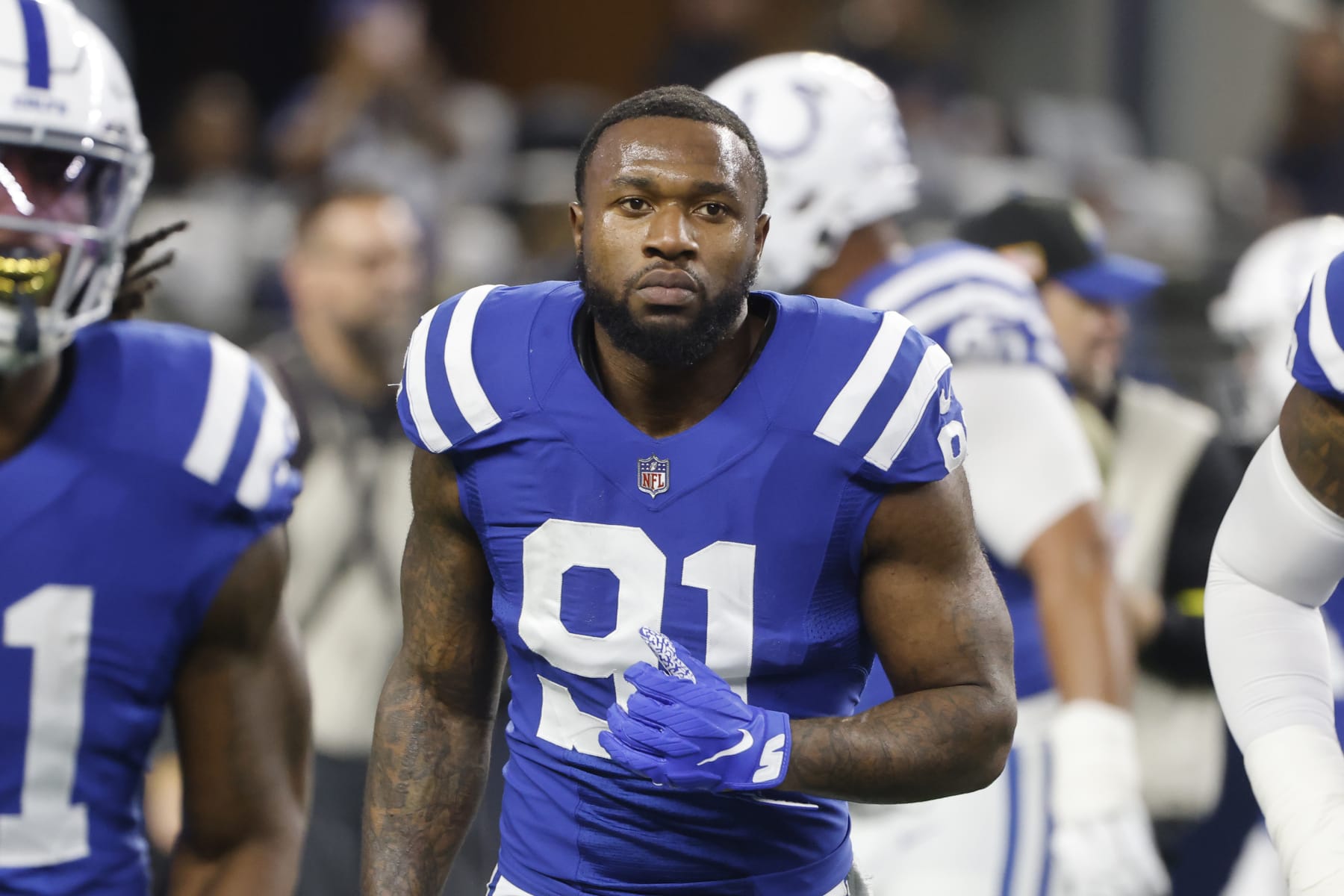 Indianapolis Colts defensive end Yannick Ngakoue (91) walks on the field during an NFL Football game in Arlington, Texas, Sunday, Dec. 4, 2022. (AP Photo/Michael Ainsworth)