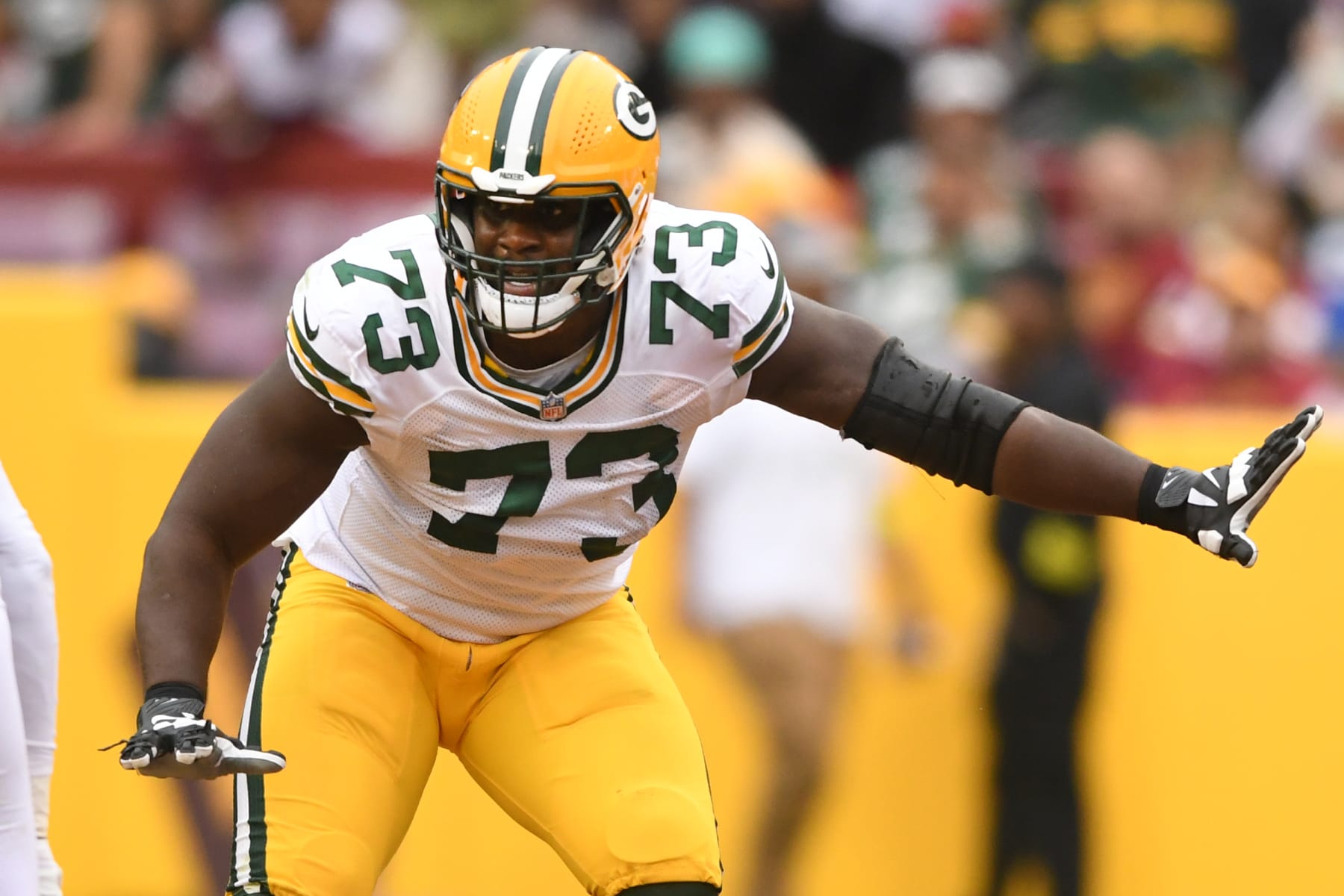 LANDOVER, MD - OCTOBER 23:  Yosh Nijman #73 of the Green Bay Packers in position during a NFL football game against the Washington Commanders at FedEx Field on October 23, 2022 in Landover, Maryland.  (Photo by Mitchell Layton/Getty Images)