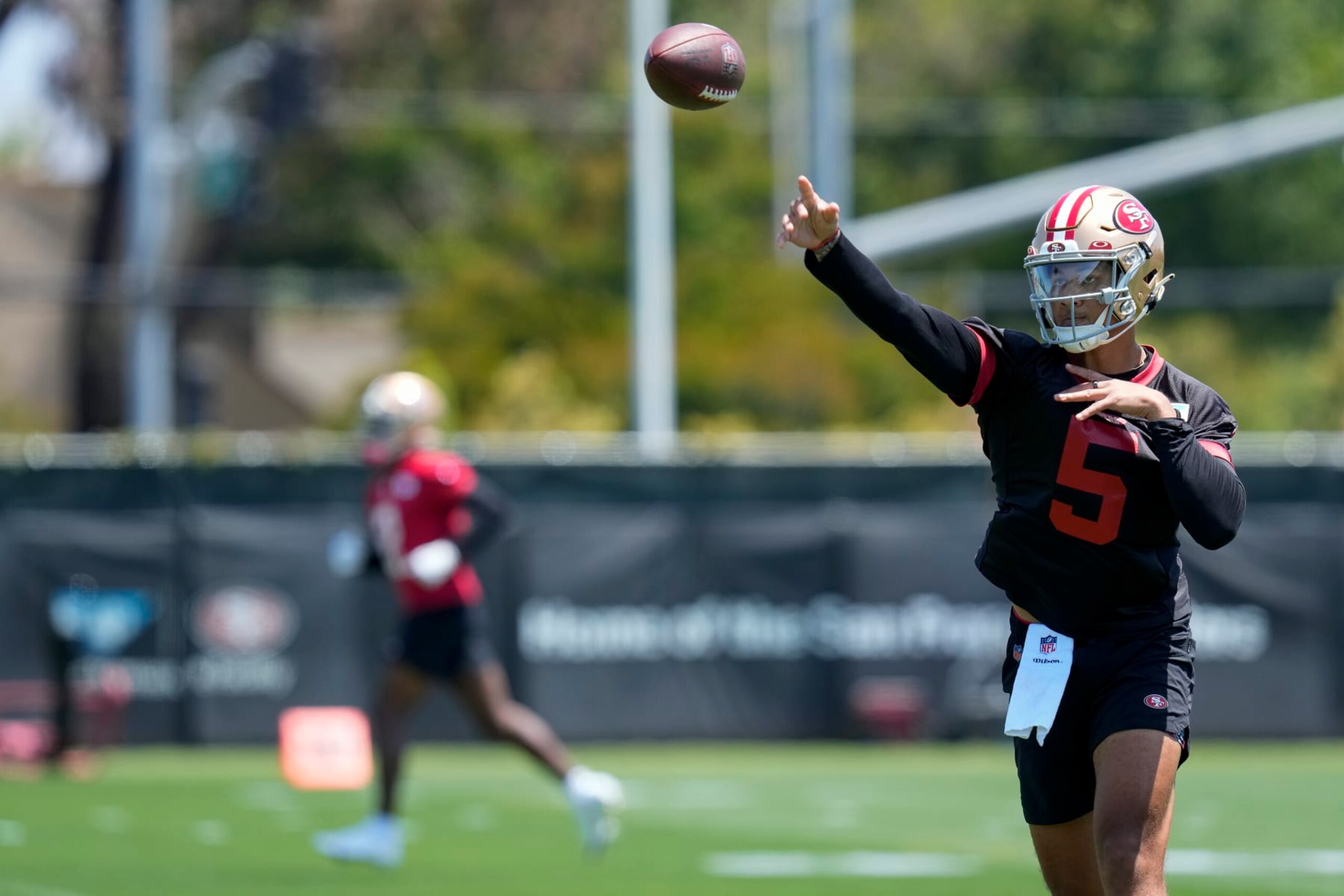 San Francisco 49ers quarterback Trey Lance throws a pass during NFL football practice Tuesday, May 23, 2023, in Santa Clara, Calif. (AP Photo/Godofredo A. Vásquez)