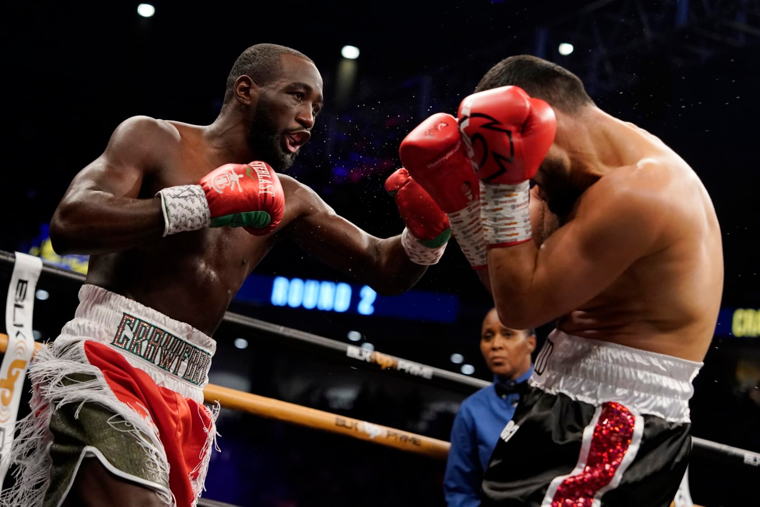 OMAHA, NEBRASKA - DECEMBER 10:  WBO champion Terence Crawford (L) punches David Avanesyan during their welterweight title fight at CHI Health Center on December 10, 2022 in Omaha, Nebraska. (Photo by Ed Zurga/Getty Images)