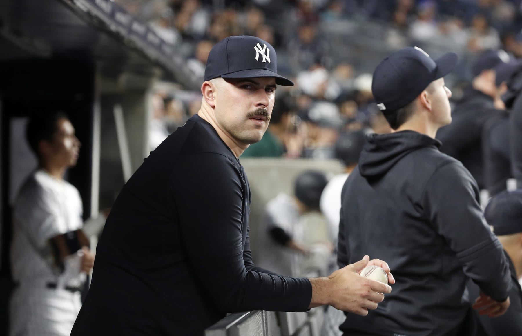BRONX, NEW YORK - MAY 25:  Carlos Rodon #55 of the New York Yankees looks on from the dugout during a game against the Baltimore Orioles at Yankee Stadium on May 25, 2023 in Bronx, New York. (Photo by Jim McIsaac/Getty Images)