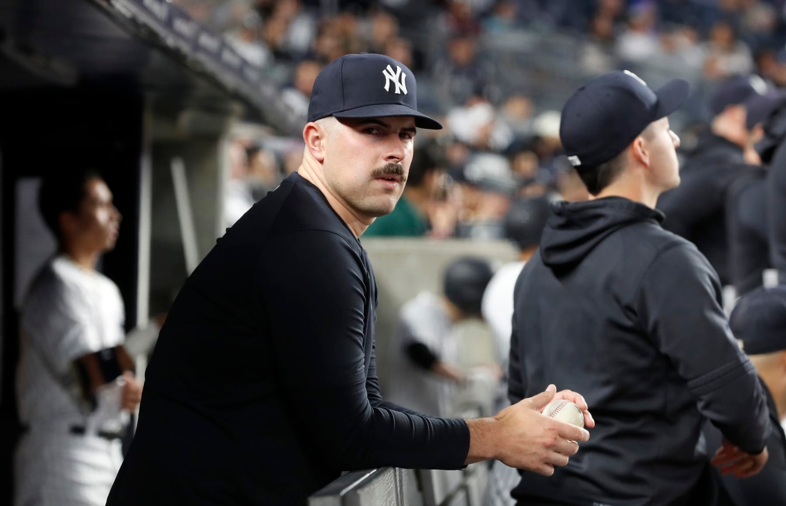BRONX, NEW YORK - MAY 25:  Carlos Rodon #55 of the New York Yankees looks on from the dugout during a game against the Baltimore Orioles at Yankee Stadium on May 25, 2023 in Bronx, New York. (Photo by Jim McIsaac/Getty Images)