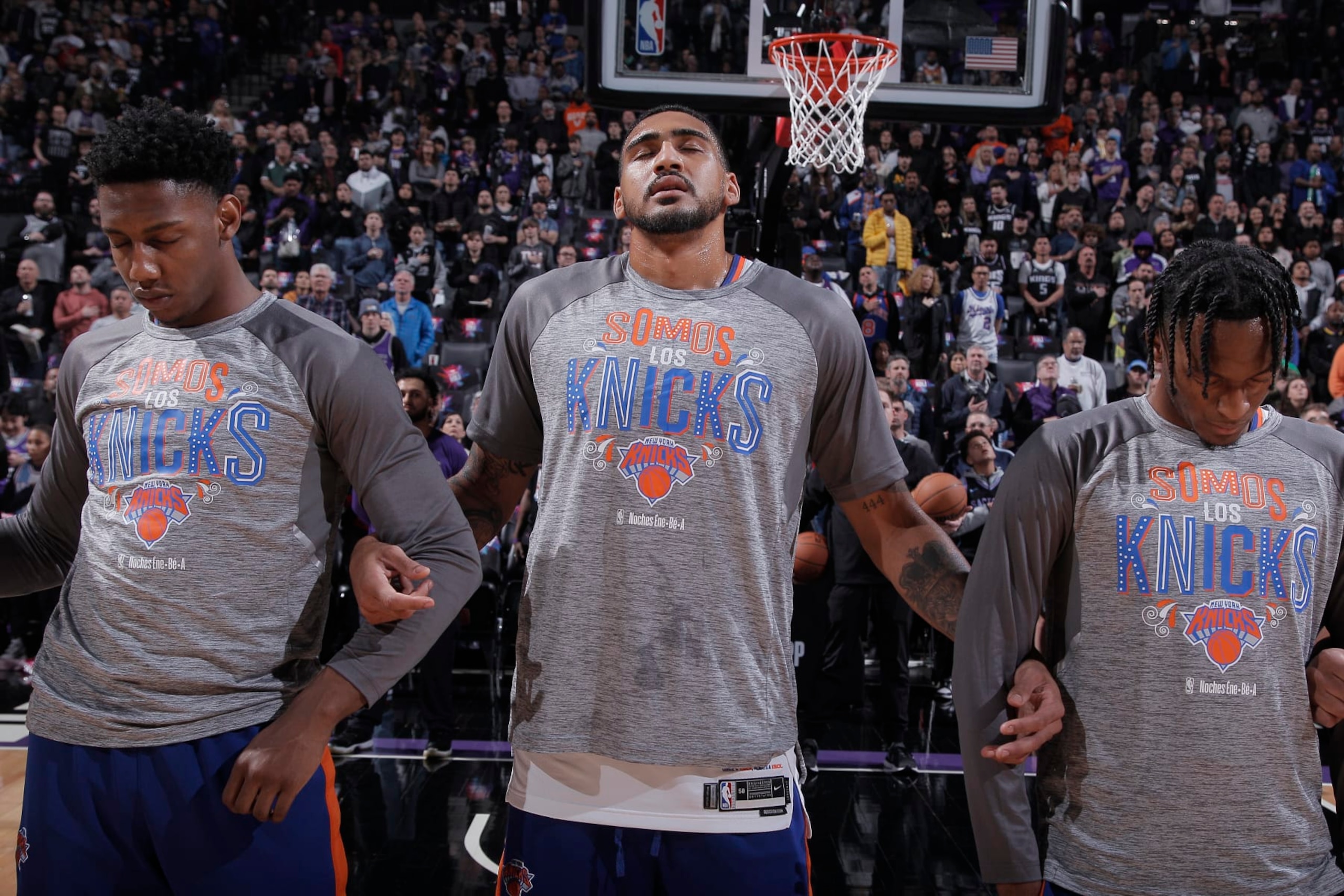 SACRAMENTO, CA - MARCH 9: RJ Barrett #9, Obi Toppin #1, and Immanuel Quickley #5 of the New York Knicks stand for the national anthem prior to the game against the Sacramento Kings on March 9, 2023 at Golden 1 Center in Sacramento, California. NOTE TO USER: User expressly acknowledges and agrees that, by downloading and or using this photograph, User is consenting to the terms and conditions of the Getty Images Agreement. Mandatory Copyright Notice: Copyright 2023 NBAE (Photo by Rocky Widner/NBAE via Getty Images)