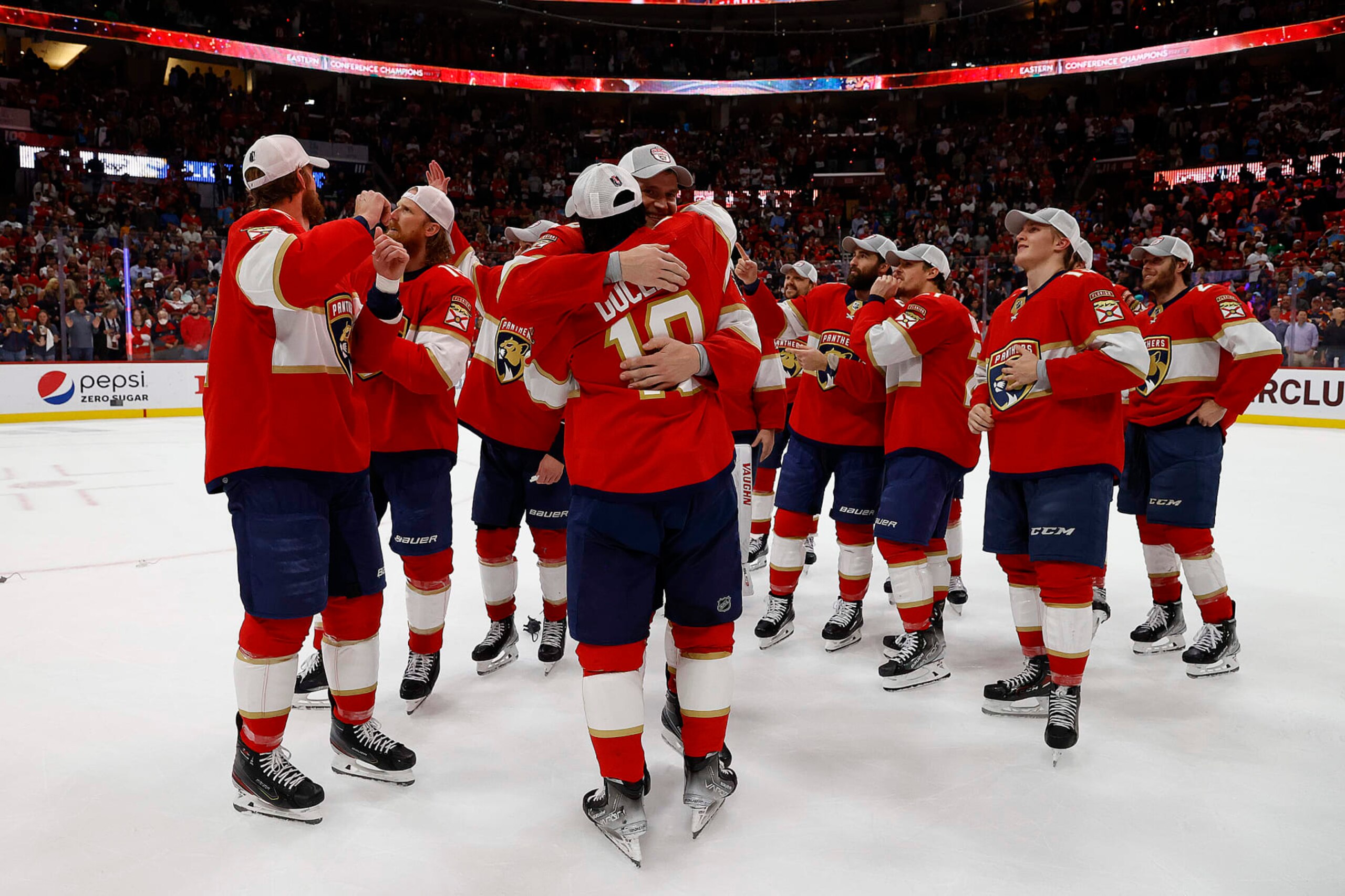 SUNRISE, FLORIDA - MAY 24: Anthony Duclair #10 and Aleksander Barkov #16 of the Florida Panthers hug after their 4-3 win over the Carolina Hurricanes in Game Four of the Eastern Conference Final of the 2023 Stanley Cup Playoffs at the FLA Live Arena on May 24, 2023 in Sunrise, Florida. (Photo by Eliot J. Schechter/NHLI via Getty Images) SUNRISE, FLORIDA - MAY 24: Anthony Duclair #10 and Aleksander Barkov #16 of the Florida Panthers hug after their 4-3 win over the Carolina Hurricanes in Game Four of the Eastern Conference Final of the 2023 Stanley Cup Playoffs at the FLA Live Arena on May 24, 2023 in Sunrise, Florida. (Photo by Eliot J. Schechter/NHLI via Getty Images)