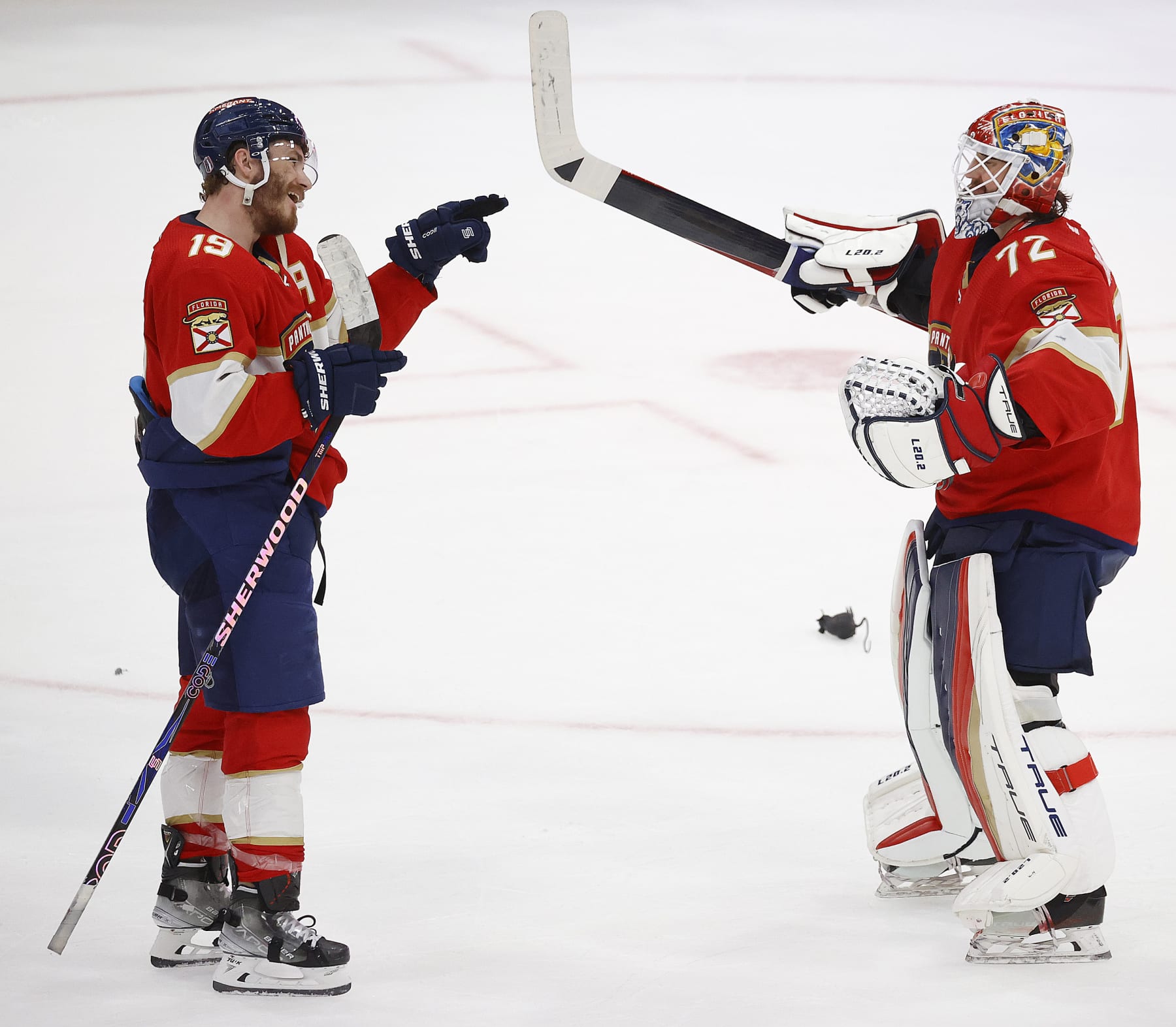 SUNRISE, FLORIDA - MAY 22: Goaltender Sergei Bobrovsky #72 of the Florida Panthers celebrates with teammate Matthew Tkachuk #19 their 1-0 win against the Carolina Hurricanes in Game Three of the Eastern Conference Final of the 2023 Stanley Cup Playoffs at the FLA Live Arena on May 22, 2023 in Sunrise, Florida. (Photo by Eliot J. Schechter/NHLI via Getty Images)