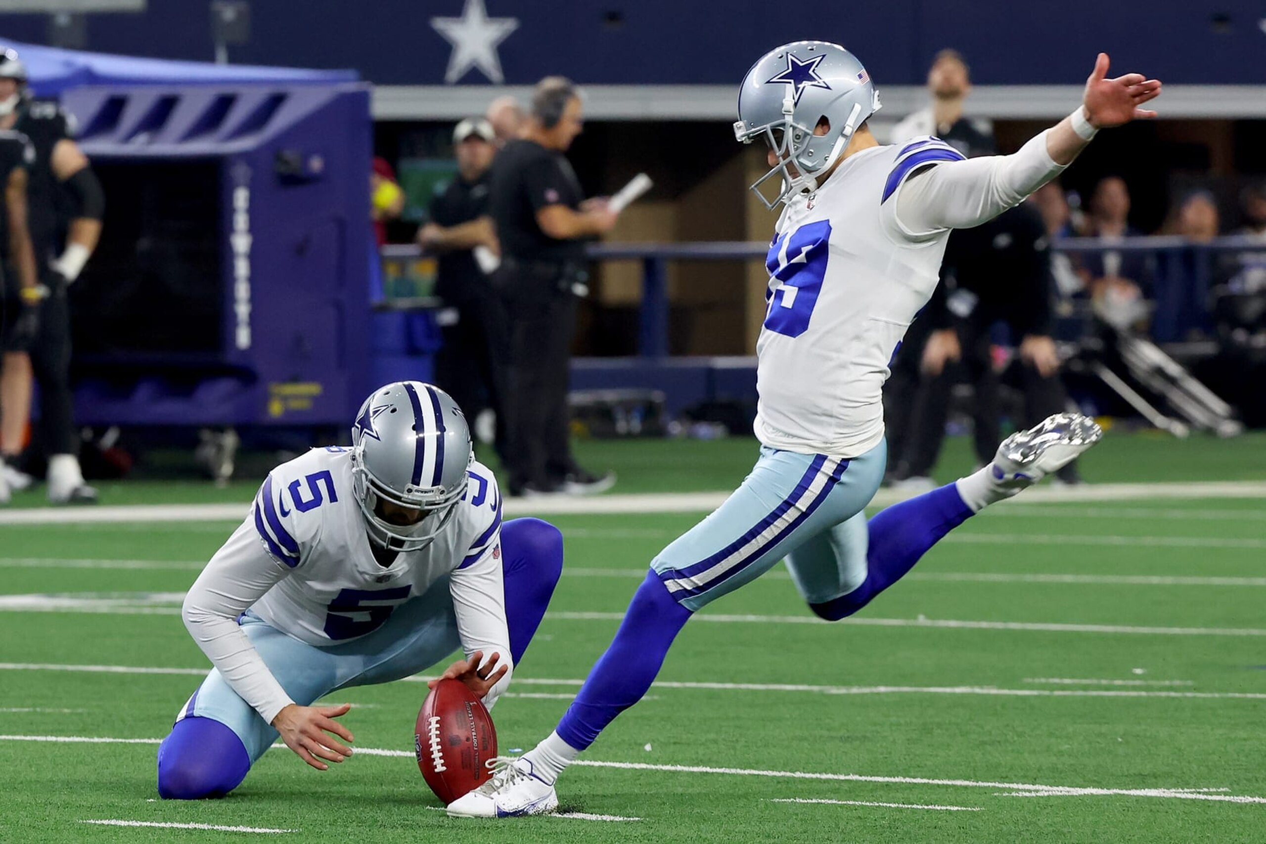 ARLINGTON, TEXAS - DECEMBER 24: Brett Maher #19 of the Dallas Cowboys kicks a field goal during the fourth quarter in the game against the Philadelphia Eagles at AT&T Stadium on December 24, 2022 in Arlington, Texas. (Photo by Richard Rodriguez/Getty Images)
