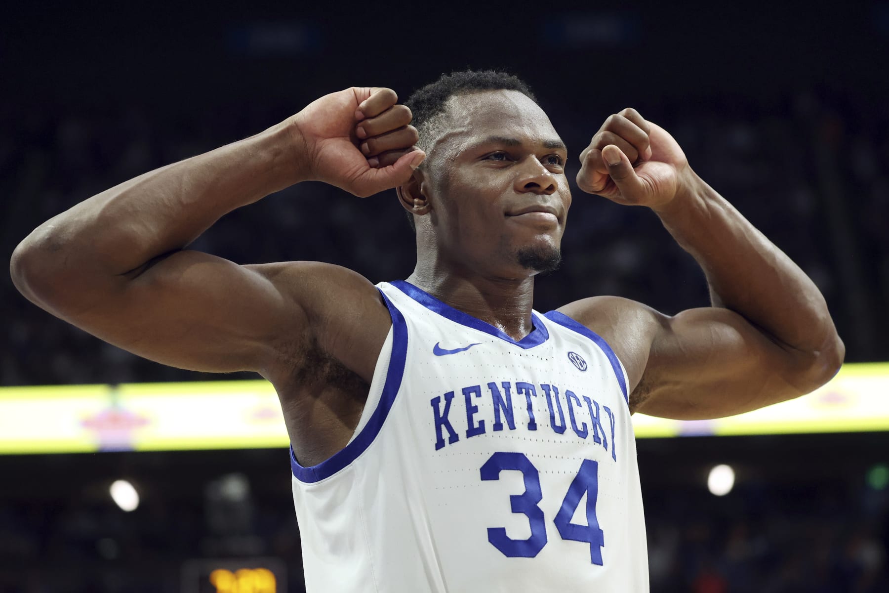 Kentucky's Oscar Tshiebwe (34) celebrates late in the second half of an NCAA college basketball game against Auburn in Lexington, Ky., Saturday, Feb. 25, 2023. (AP Photo/James Crisp)