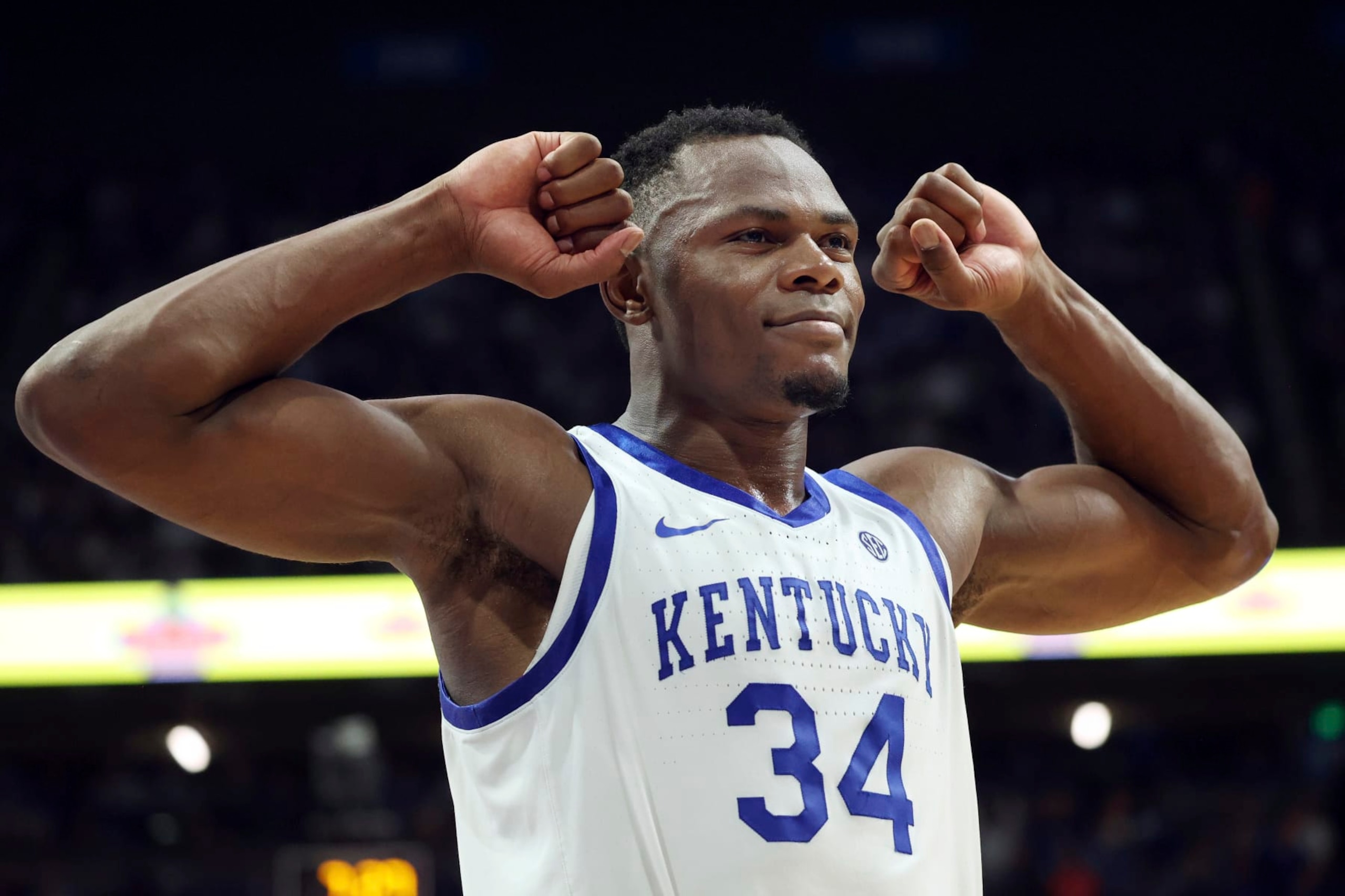 Kentucky's Oscar Tshiebwe (34) celebrates late in the second half of an NCAA college basketball game against Auburn in Lexington, Ky., Saturday, Feb. 25, 2023. (AP Photo/James Crisp)