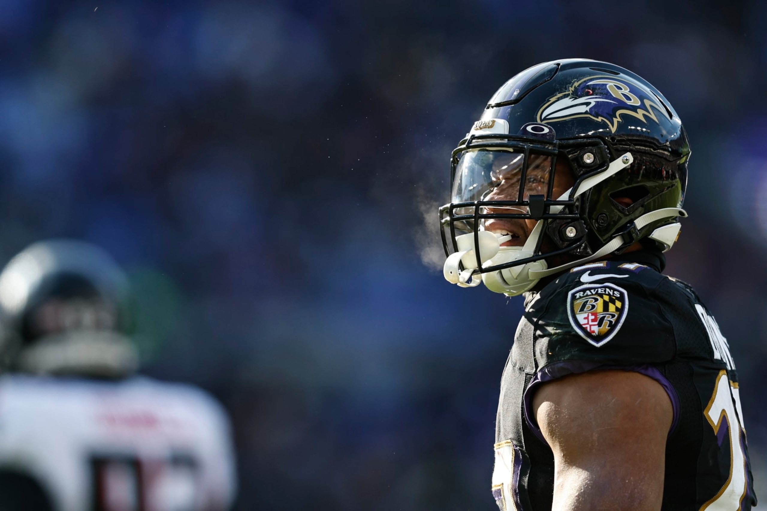 BALTIMORE, MARYLAND - DECEMBER 24: J.K. Dobbins #27 of the Baltimore Ravens reacts after making a run during an NFL football game between the Baltimore Ravens and the Atlanta Falcons at M&T Bank Stadium on December 24, 2022 in Baltimore, Maryland. (Photo by Michael Owens/Getty Images)