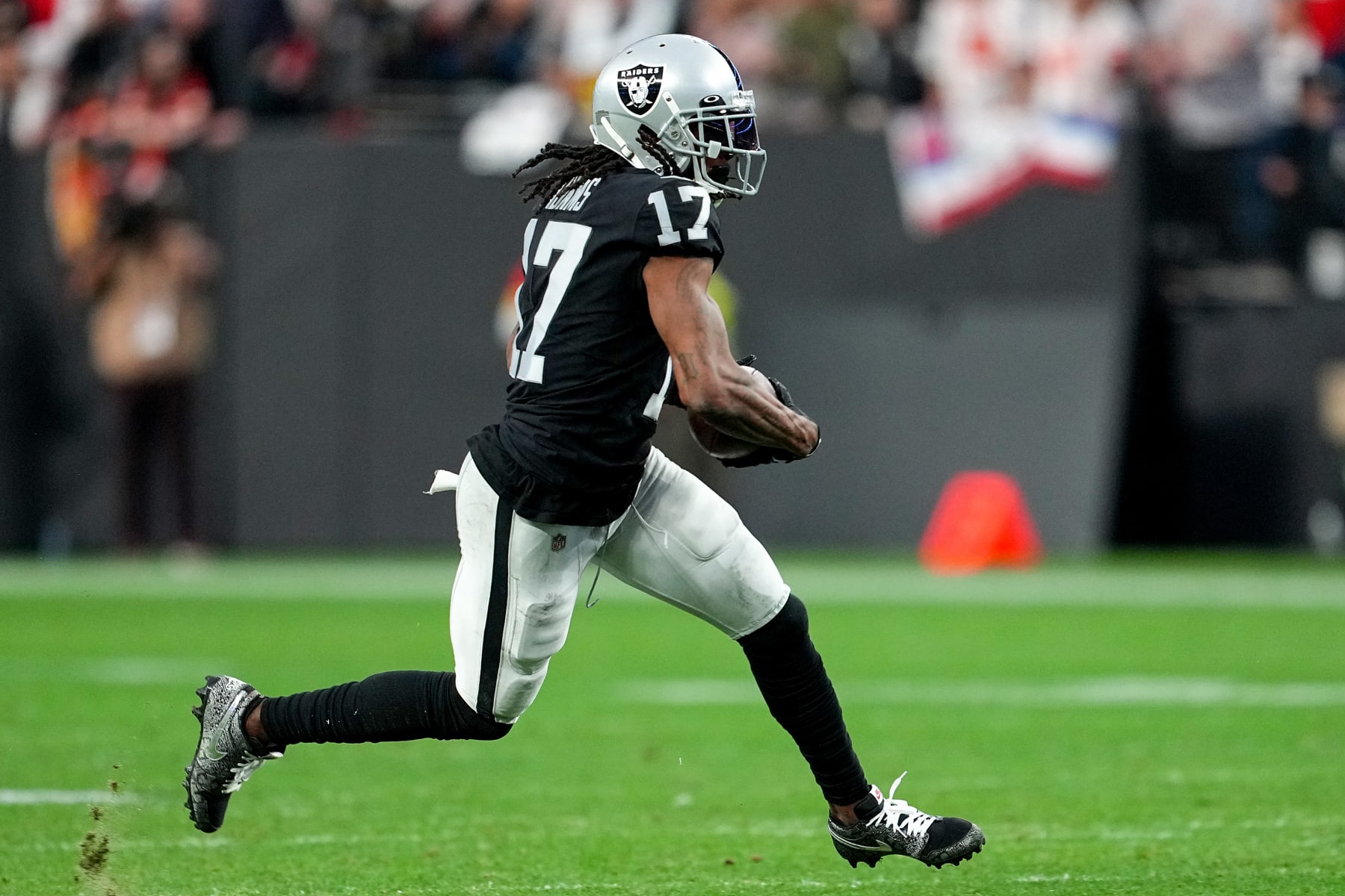 LAS VEGAS, NEVADA - JANUARY 07: Davante Adams #17 of the Las Vegas Raiders carries the ball against the Kansas City Chiefs during the first half of the game at Allegiant Stadium on January 07, 2023 in Las Vegas, Nevada. (Photo by Jeff Bottari/Getty Images)