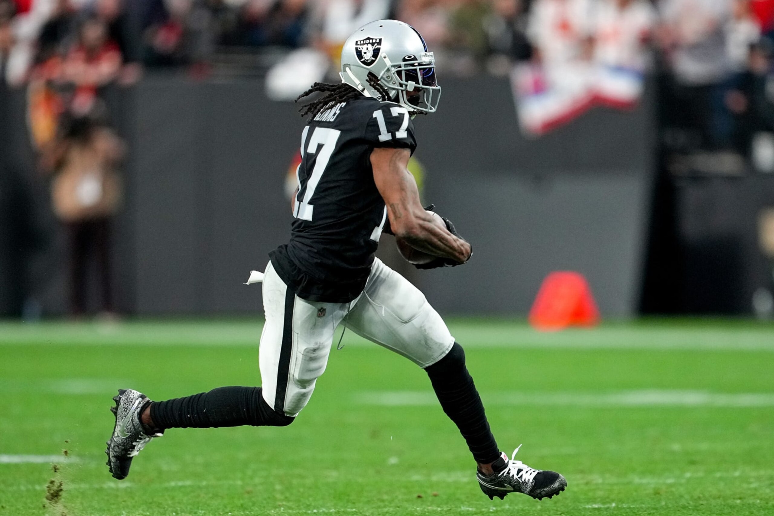 LAS VEGAS, NEVADA - JANUARY 07: Davante Adams #17 of the Las Vegas Raiders carries the ball against the Kansas City Chiefs during the first half of the game at Allegiant Stadium on January 07, 2023 in Las Vegas, Nevada. (Photo by Jeff Bottari/Getty Images)